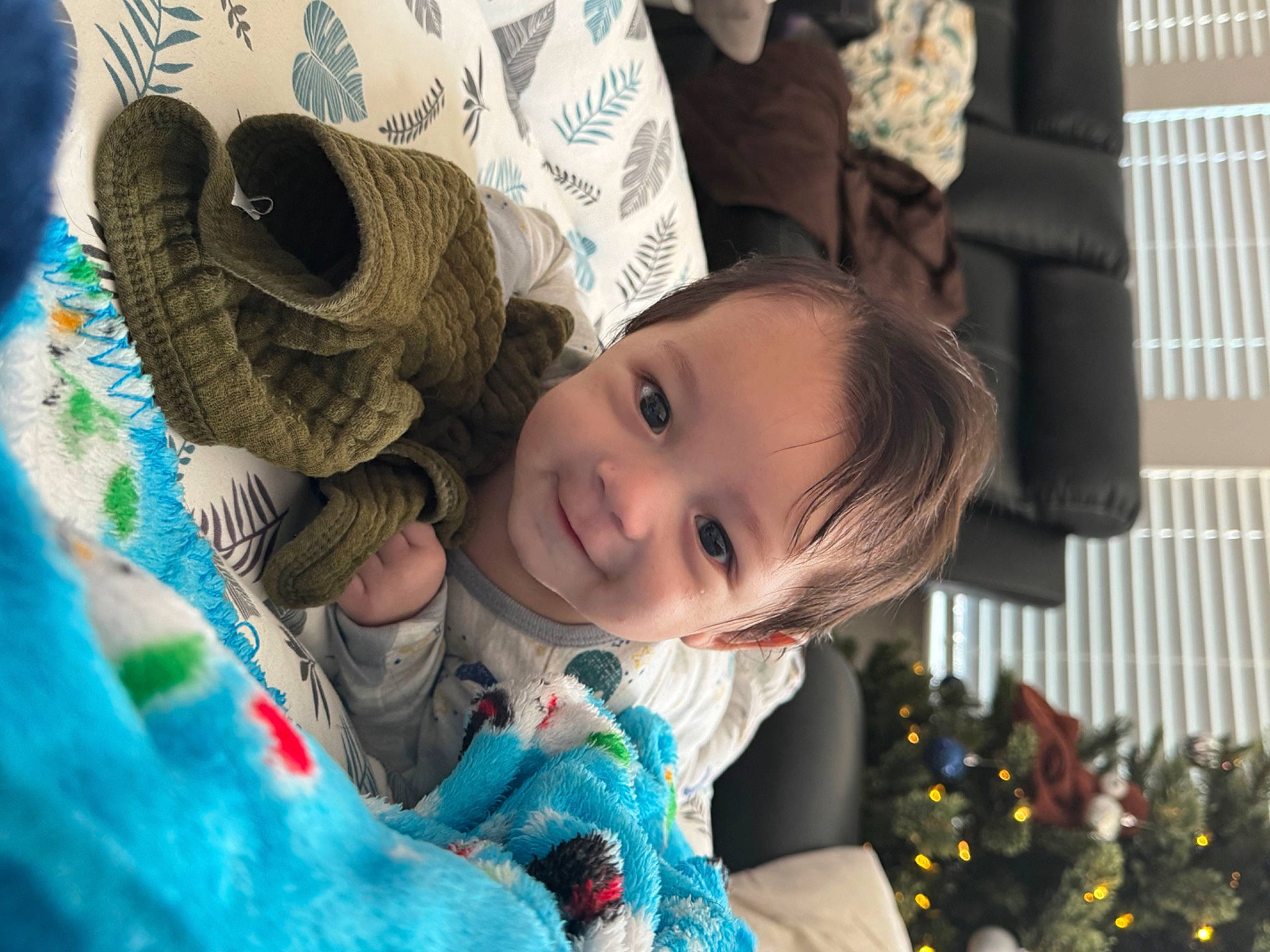 Syaoran is registered to the contest to win money with this photo: art, baby, child, event, fun, grass, happy, hat, head, joy, leisure, linens, pattern, people, person, recreation, sitting, smile, sun_hat, toddler