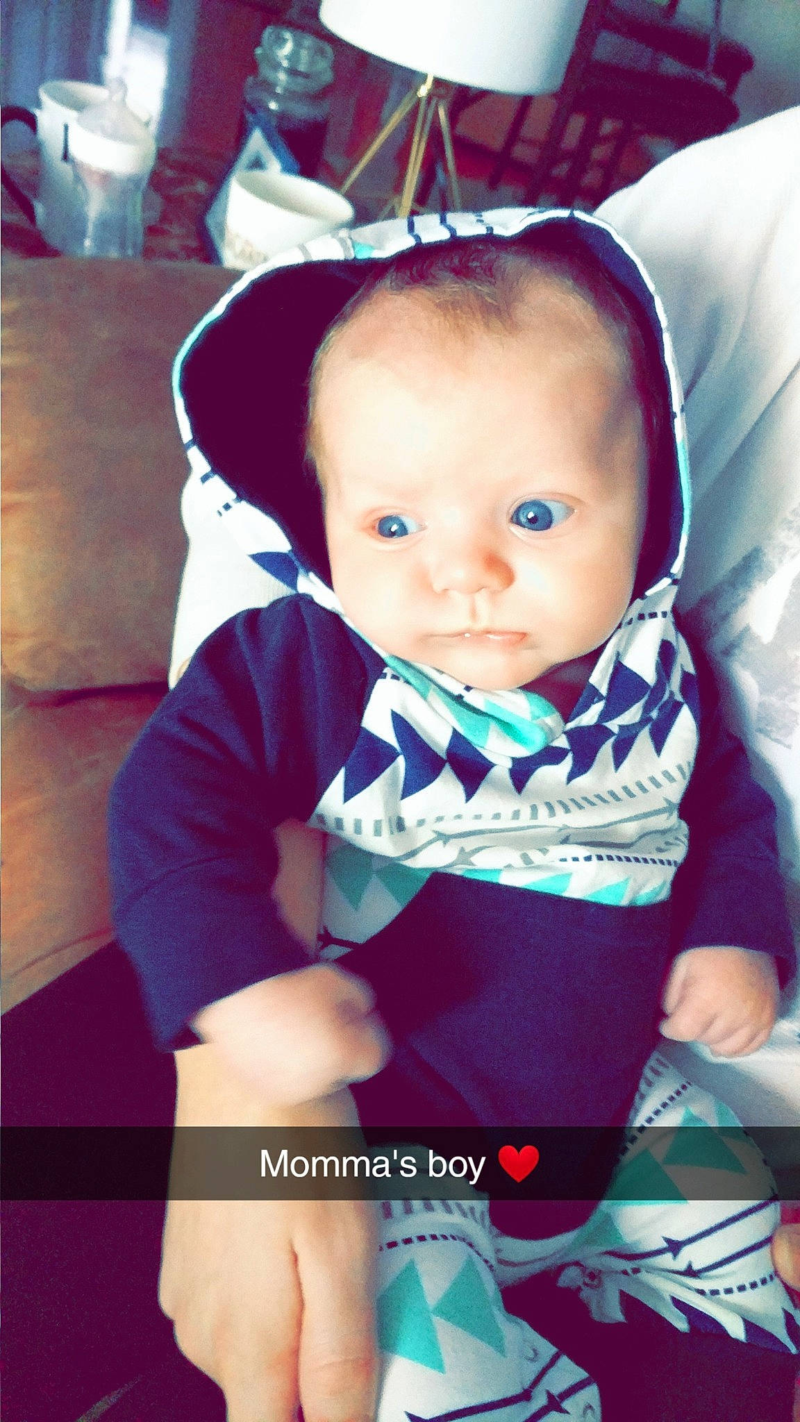 Levi is registered to the contest to win money with this photo: arm, baby, baby_products, black_hair, cheek, child, child_model, cool, ear, head, mouth, nose, person, photography, product, sitting, skin, smile, toddler