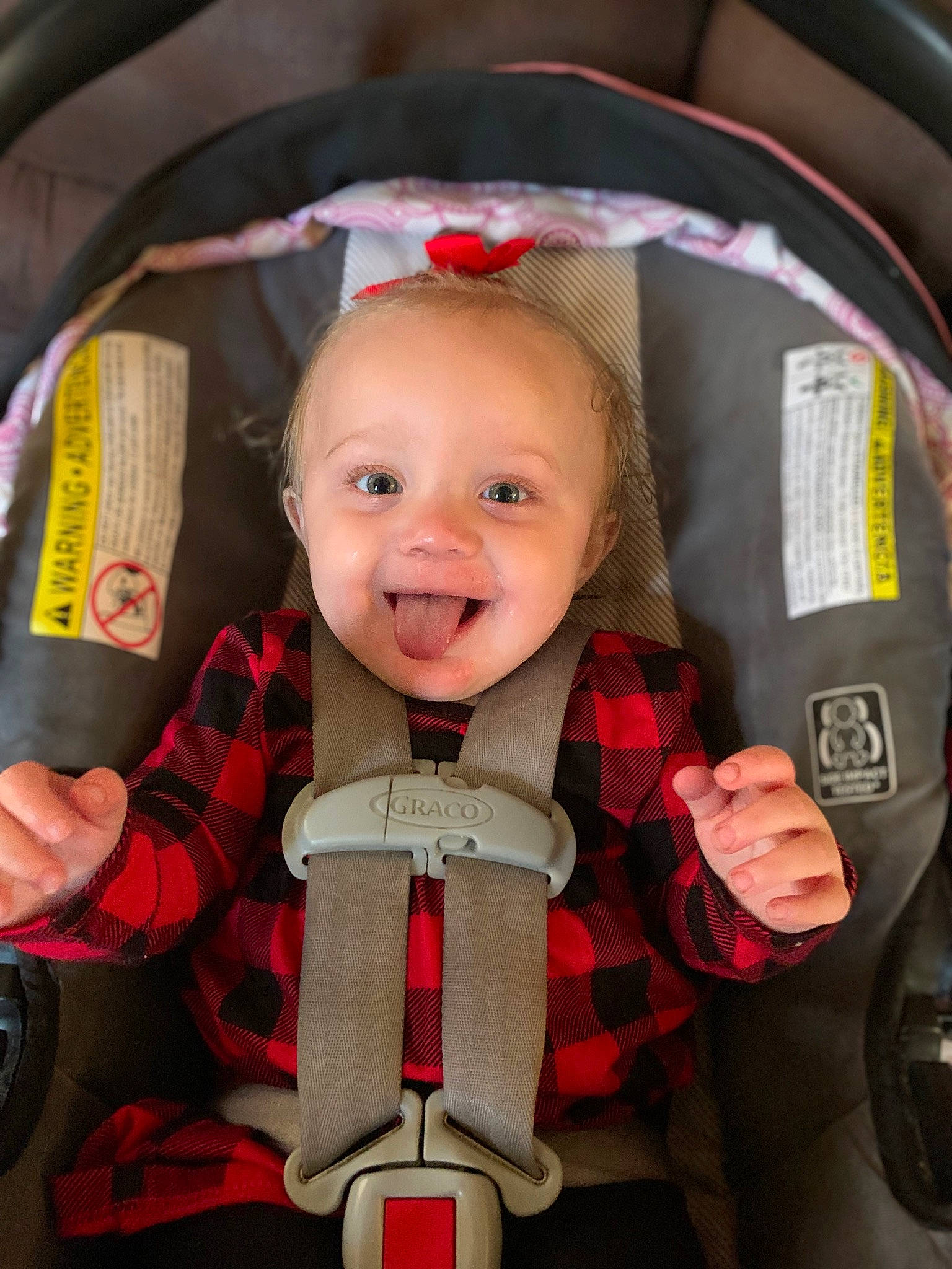 Journi is registered to the contest to win money with this photo: auto_part, baby, baby_carriage, baby_products, car_seat, carmine, cheek, child, fun, happy, motor_vehicle, person, personal_protective_equipment, pink, product, red, seat_belt, service, skin, smile