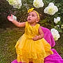 Kiara joined the competition — help win amazing prizes! toddler, child, yellow_dress, headband, flower, hydrangea, outdoor, garden, grass, purple_blanket, greenery, cute, curious, nature, sitting, portrait, baby, sequin, bright_colors, young_child