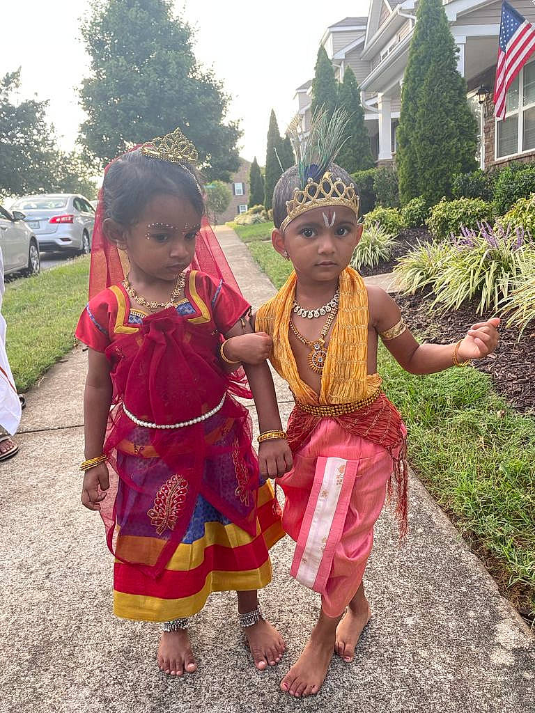 Nethran joined the competition — help win amazing prizes! botany, car, event, fun, grass, happy, headwear, leisure, magenta, people_in_nature, person, plant, sandal, temple, tire, toddler, tourism, tradition, tree, village