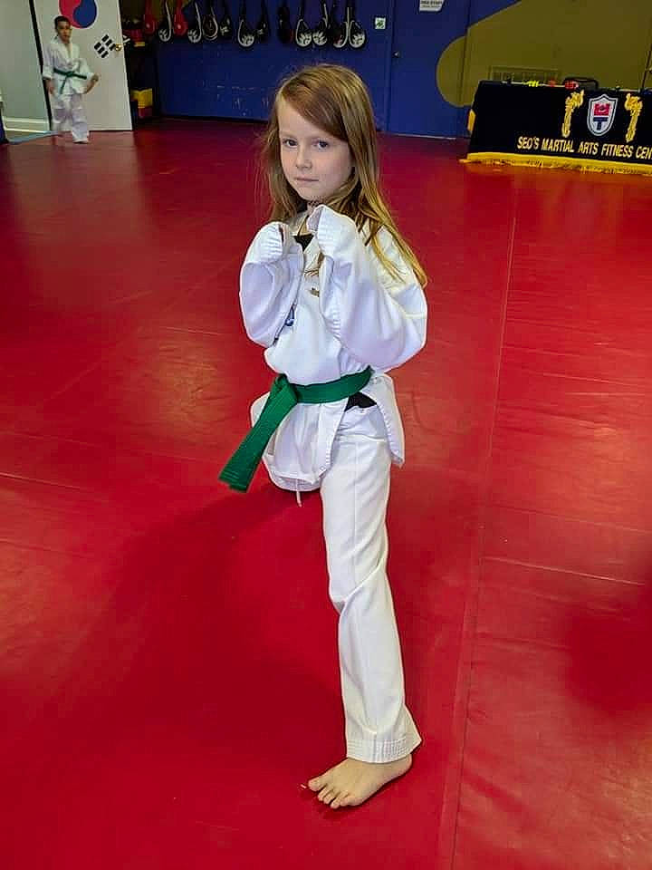 Taylor is registered to the contest to win money with this photo: carpet, combat_sport, competition_event, contact_sport, dobok, event, flooring, hair, individual_sports, japanese_martial_arts, karate, kung_fu, martial_arts, martial_arts_uniform, person, shidokan, sports, sports_uniform, striking_combat_sports, toddler