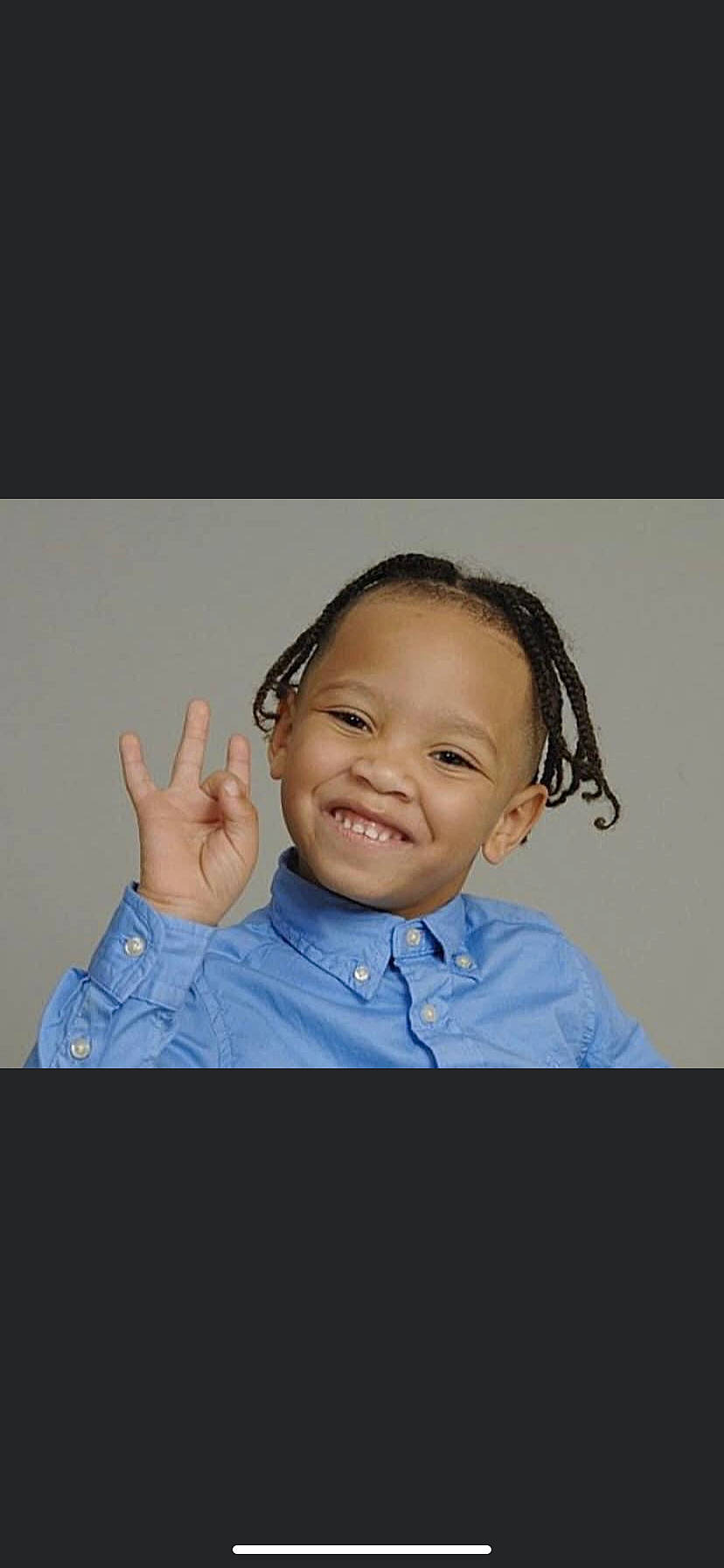 Messiah is registered to the contest to win money with this photo: arm, cheek, chin, electric_blue, eyebrow, eyelash, finger, flash_photography, fun, gesture, hand, happy, human_body, joy, nose, person, sign_language, skin, sleeve, smile