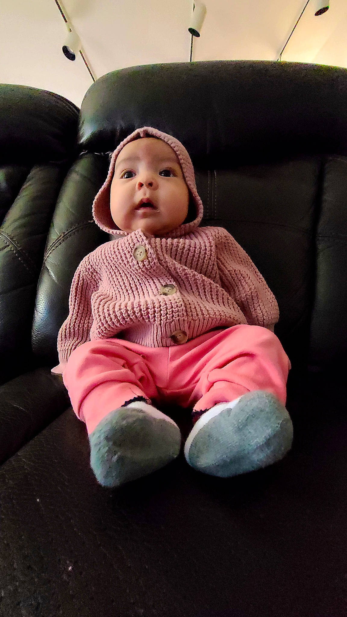 Audrey is registered to the contest to win money with this photo: auto_part, baby, baby_toddler_clothing, car_seat, cheek, child, comfort, couch, finger, flash_photography, flooring, foot, fun, grass, headwear, human_body, person, sitting, skin, sleeve