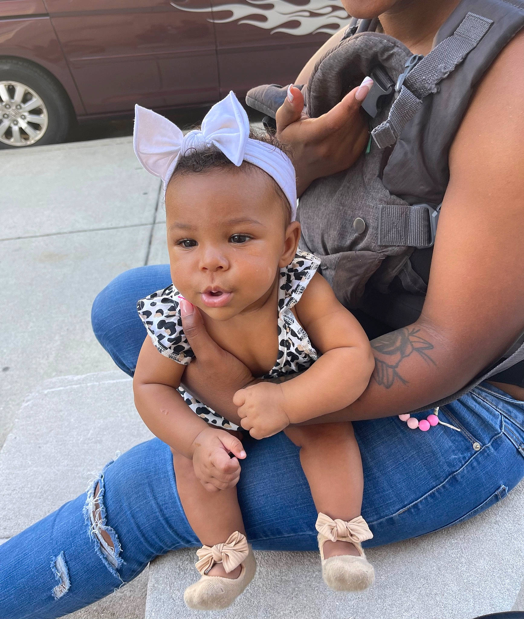 Kamiyah is registered to the contest to win money with this photo: automotive_exterior, automotive_lighting, baby, baby_toddler_clothing, child, event, family_car, fashion_accessory, fun, happy, hat, jewellery, person, recreation, sandal, sitting, thigh, tire, toddler, vehicle_door