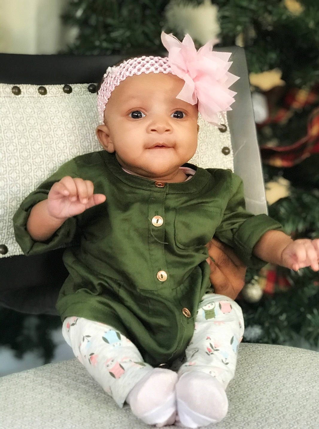 Honesti is registered to the contest to win money with this photo: baby, baby_toddler_clothing, cheek, child, head, headgear, person, pink, plant, skin, toddler