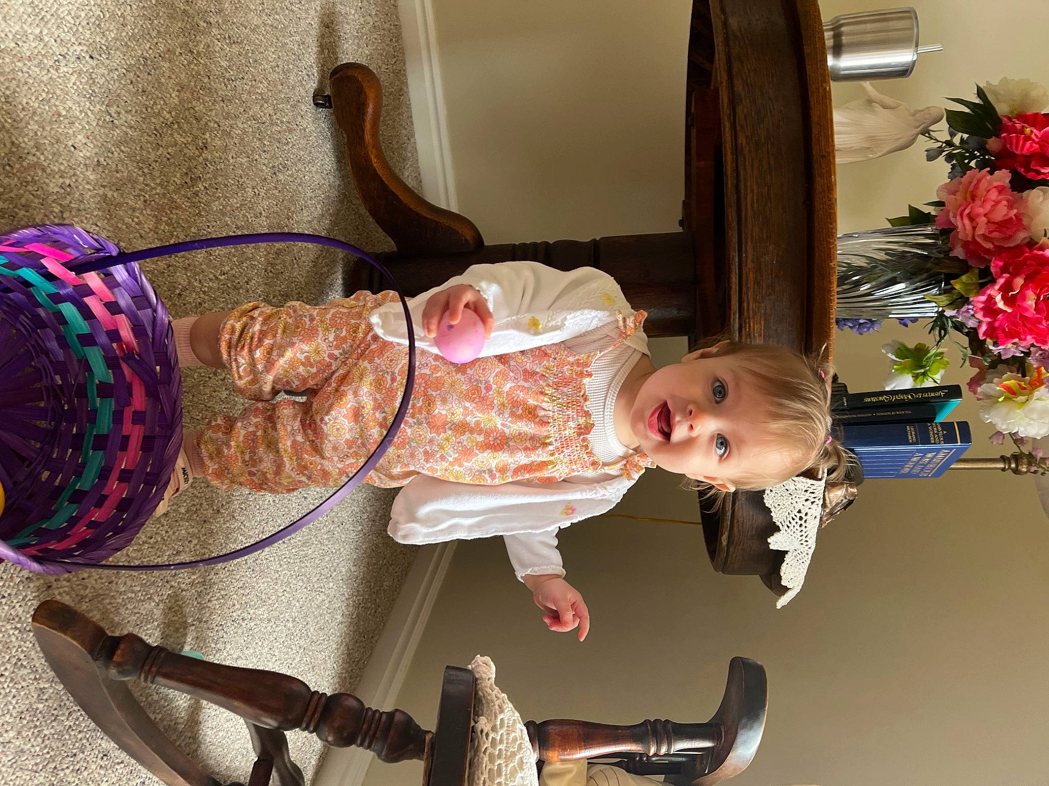 Davina is registered to the contest to win money with this photo: baby, baby_products, baby_toddler_clothing, chair, child, dress, eye, eyewear, flower_arranging, foot, fun, magenta, person, room, sandal, sitting, sock, surprise, thread, toddler