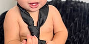 Kingston joined the competition — help win amazing prizes! toddler, child, baby, blue_eyes, black_tie, rose, flower, sitting, bare_chest, skin, hands, smile, indoor, blanket, plush, cute, portrait, young_child, soft_light, background