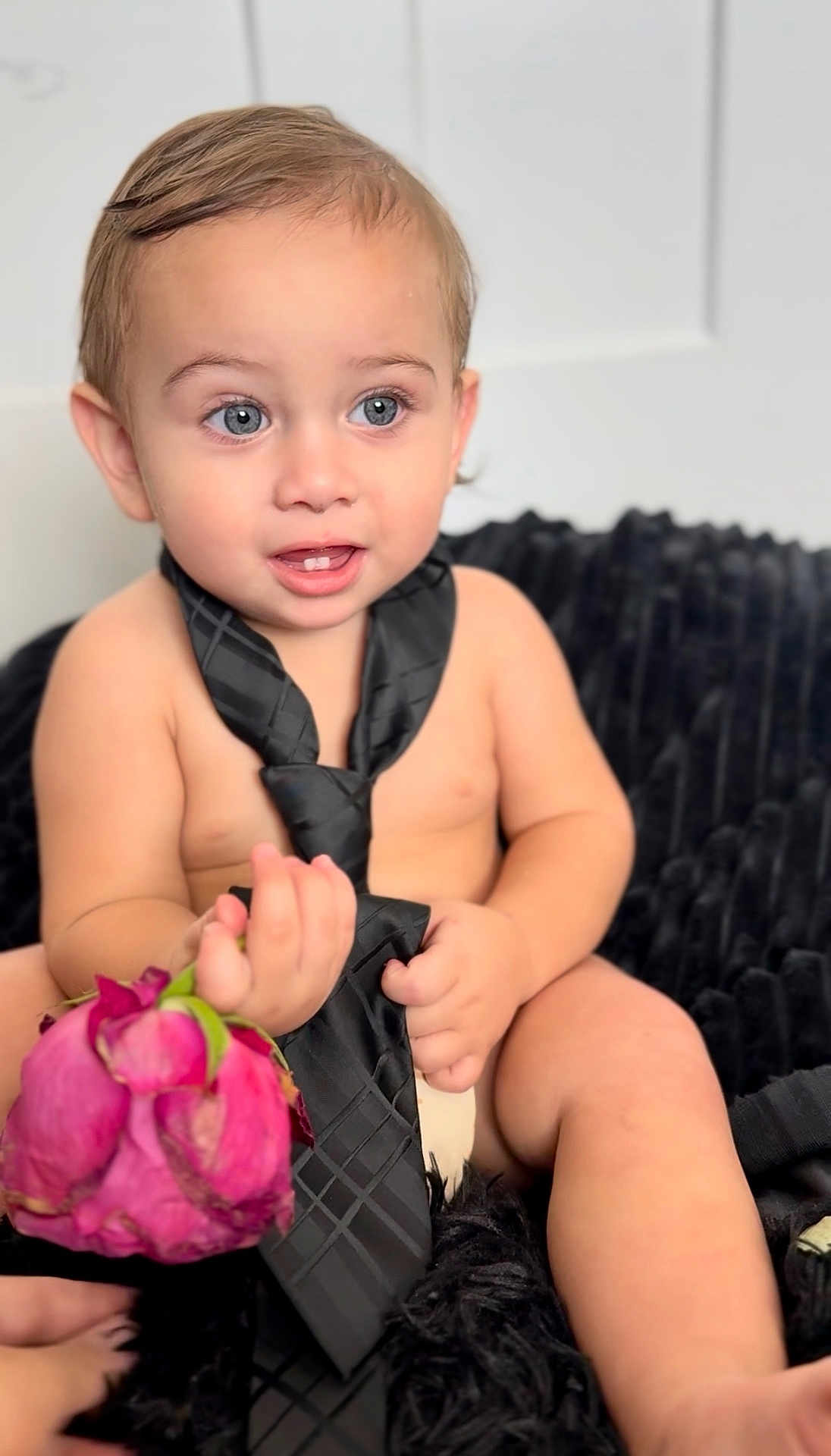 Kingston joined the competition — help win amazing prizes! toddler, child, baby, blue_eyes, black_tie, rose, flower, sitting, bare_chest, skin, hands, smile, indoor, blanket, plush, cute, portrait, young_child, soft_light, background