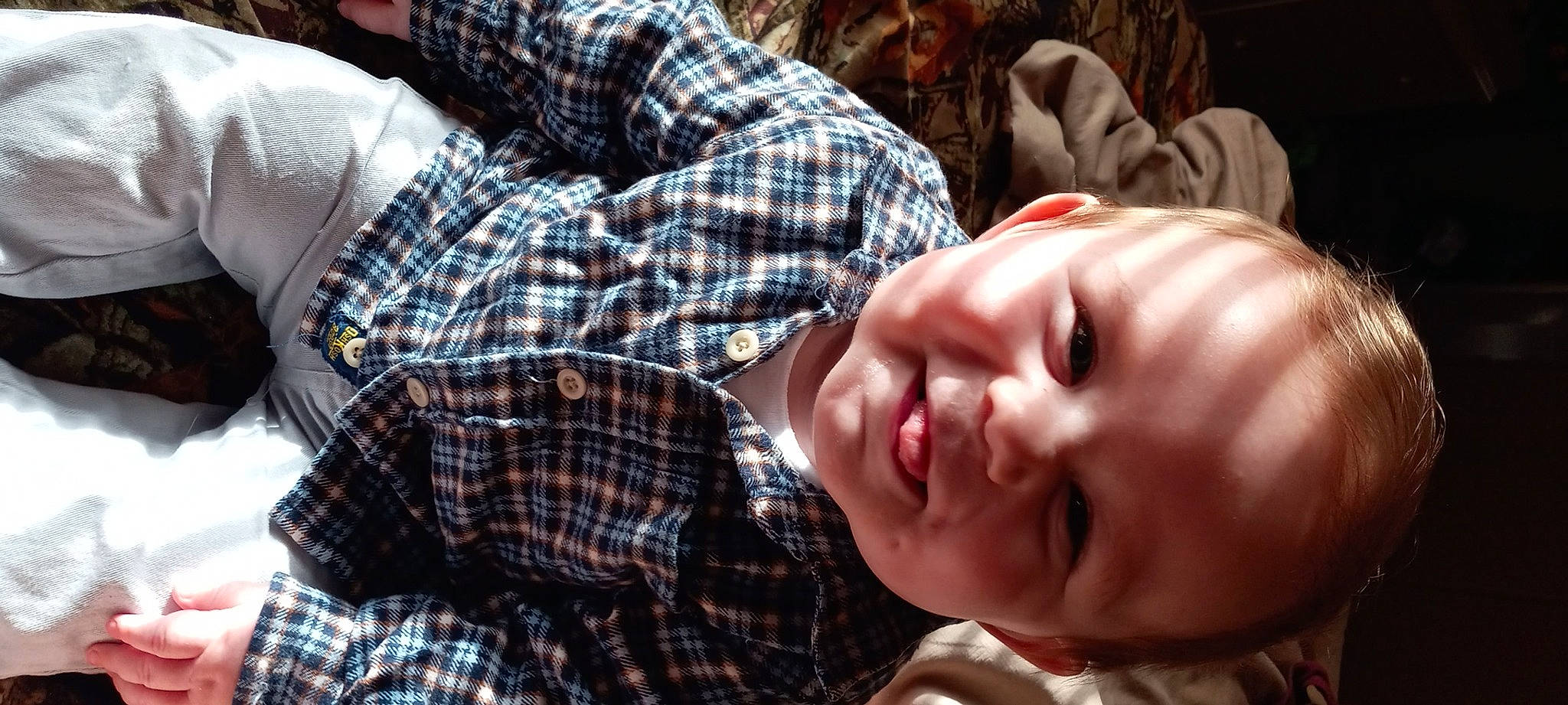 Brice joined the competition — help win amazing prizes! baby, baby_toddler_clothing, cheek, child, finger, fun, gesture, grass, happy, leaf, mouth, nose, pattern, person, plaid, plant, skin, smile, tartan, toddler