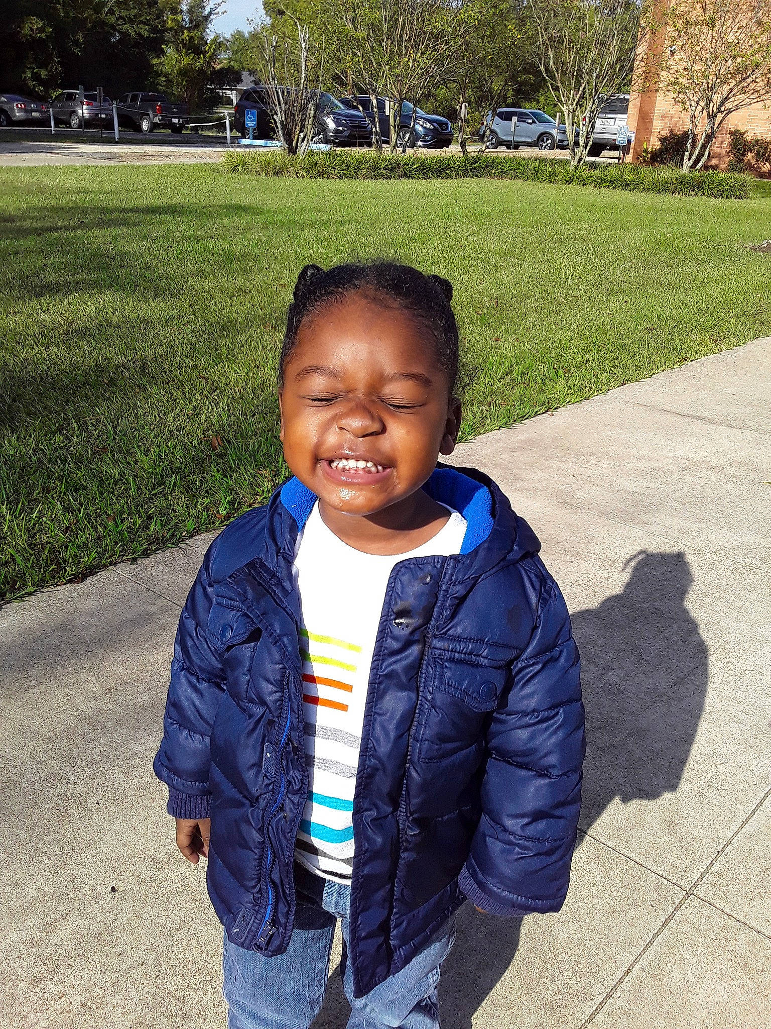 Jeremiah is registered to the contest to win money with this photo: child, cool, face, happy, head, jacket, joy, male, outerwear, people, person, photography, plant, smile, t_shirt, toddler, tree, vacation