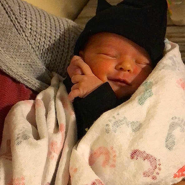 Scarlett Rose is registered to the contest to win money with this photo: arm, bedtime, cheek, child, ear, finger, hand, infant, nap, nose, person, product, skin, sleep, textile, toddler