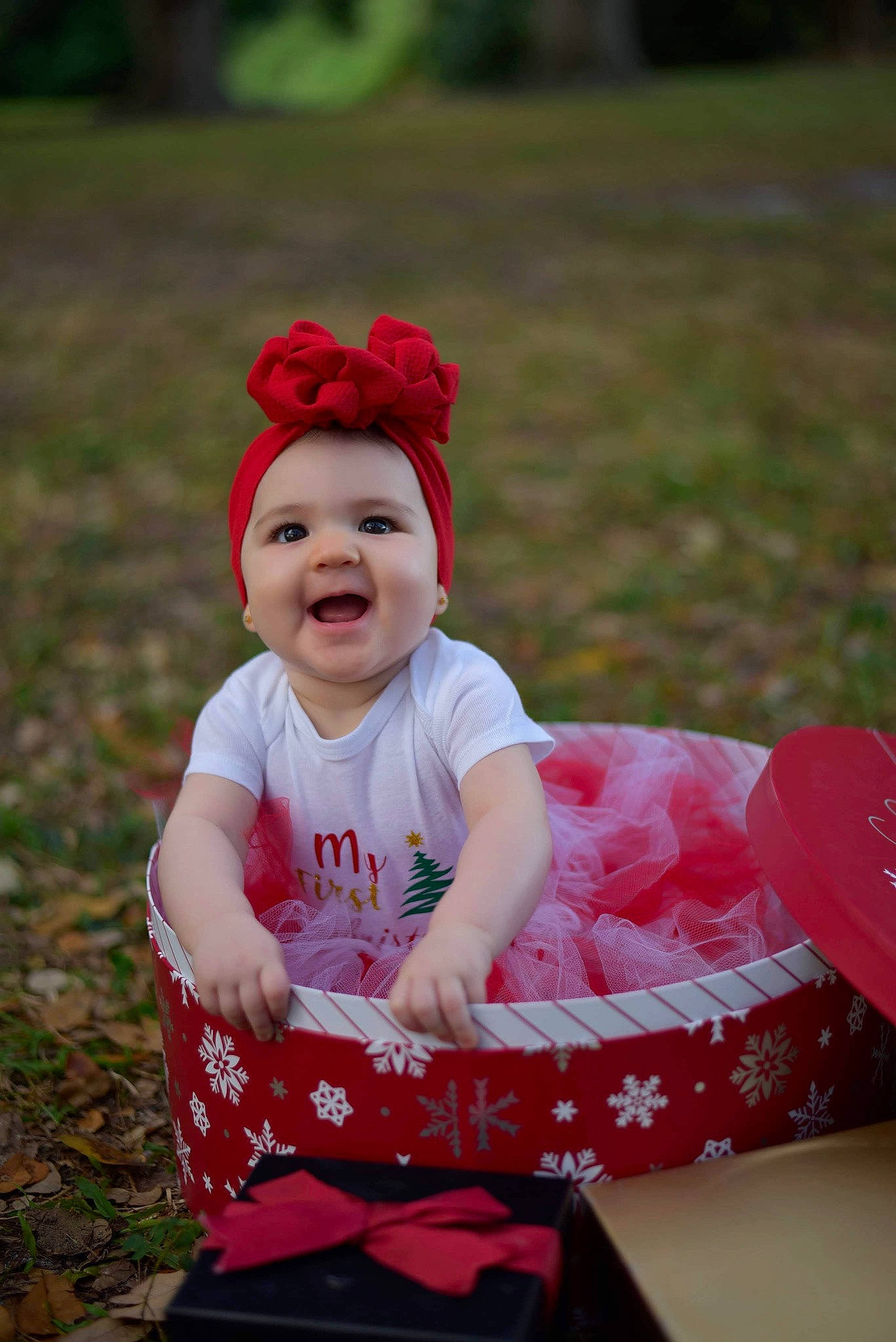 Bella Victoria joined the competition — help win amazing prizes! baby, child, costume, fun, grass, hair_accessory, happy, headgear, person, pink, red, smile, toddler