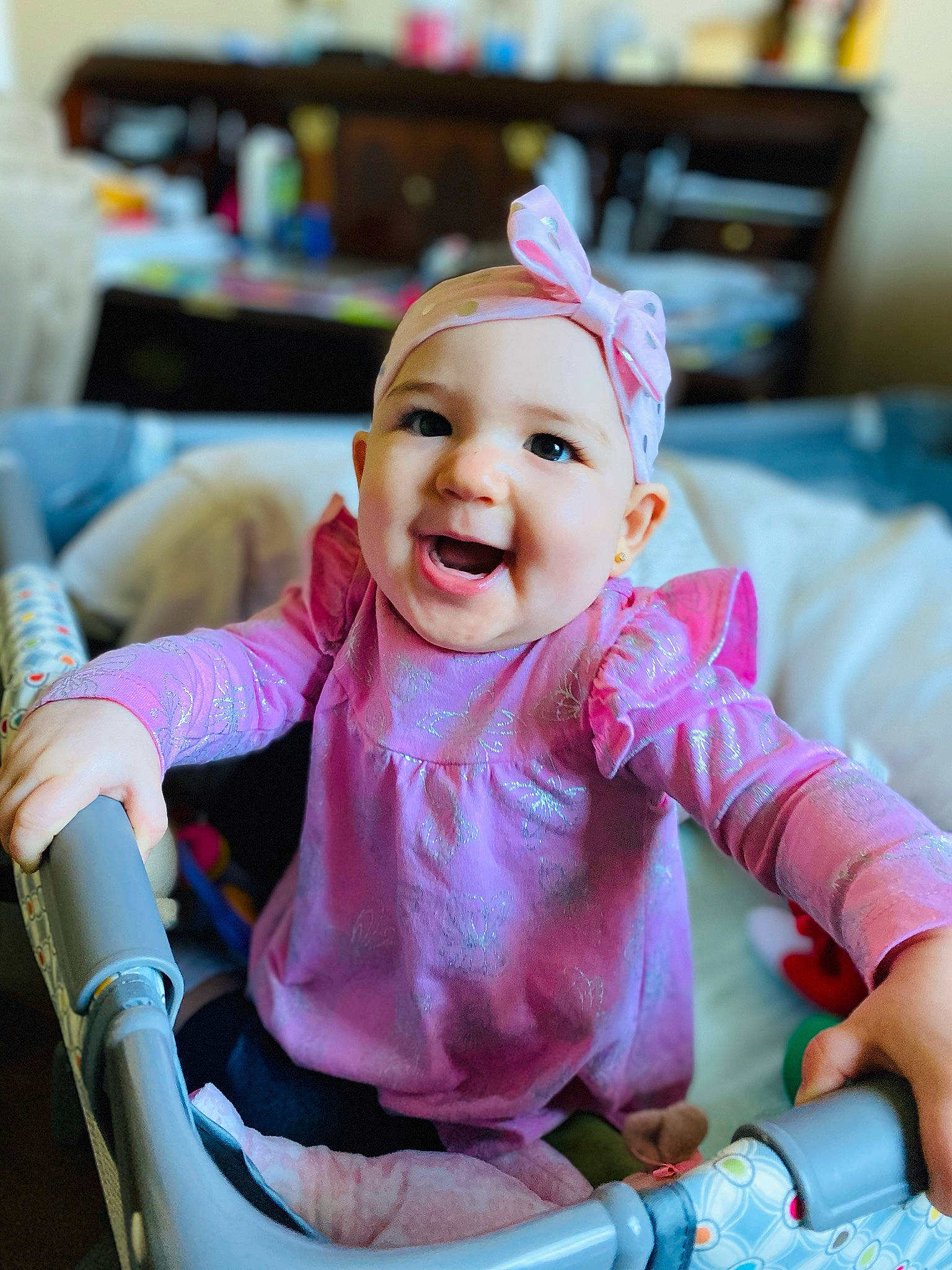 Bella Victoria joined the competition — help win amazing prizes! baby, baby_toddler_clothing, beauty, cheek, child, child_model, daughter, ear, facial_expression, hair_accessory, happy, headband, headgear, person, pink, sitting, skin, sleeve, smile, toddler