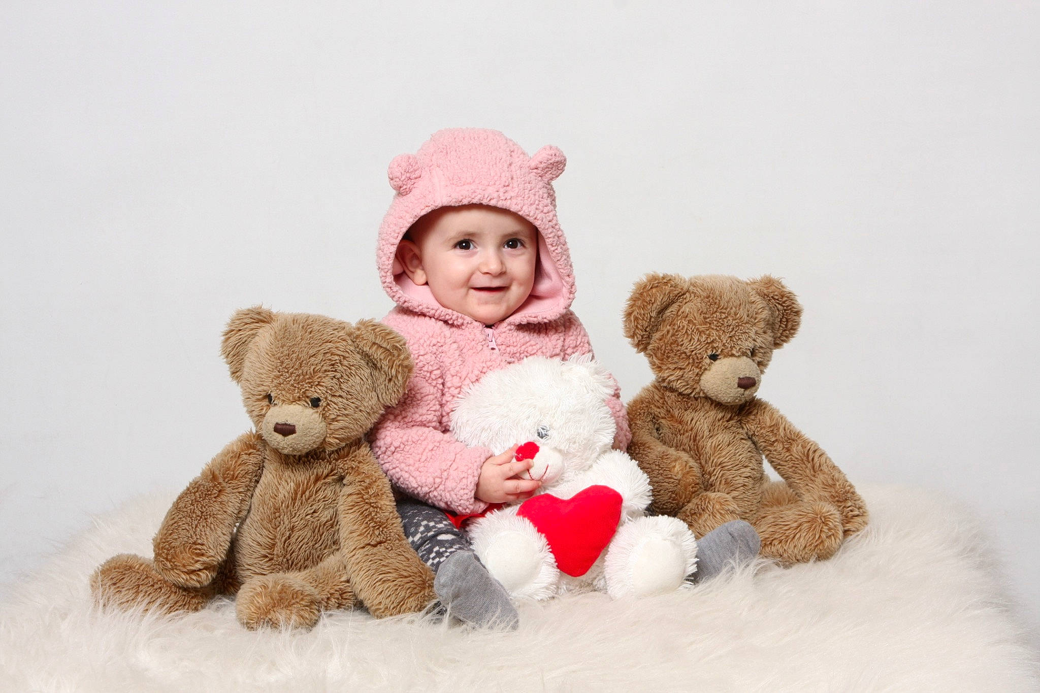 Aryanna is registered to the contest to win money with this photo: baby, bear, child, headwear, joy, love, person, pink, plush, red, smile, stuffed_toy, teddy_bear, toddler, toy, valentines_day