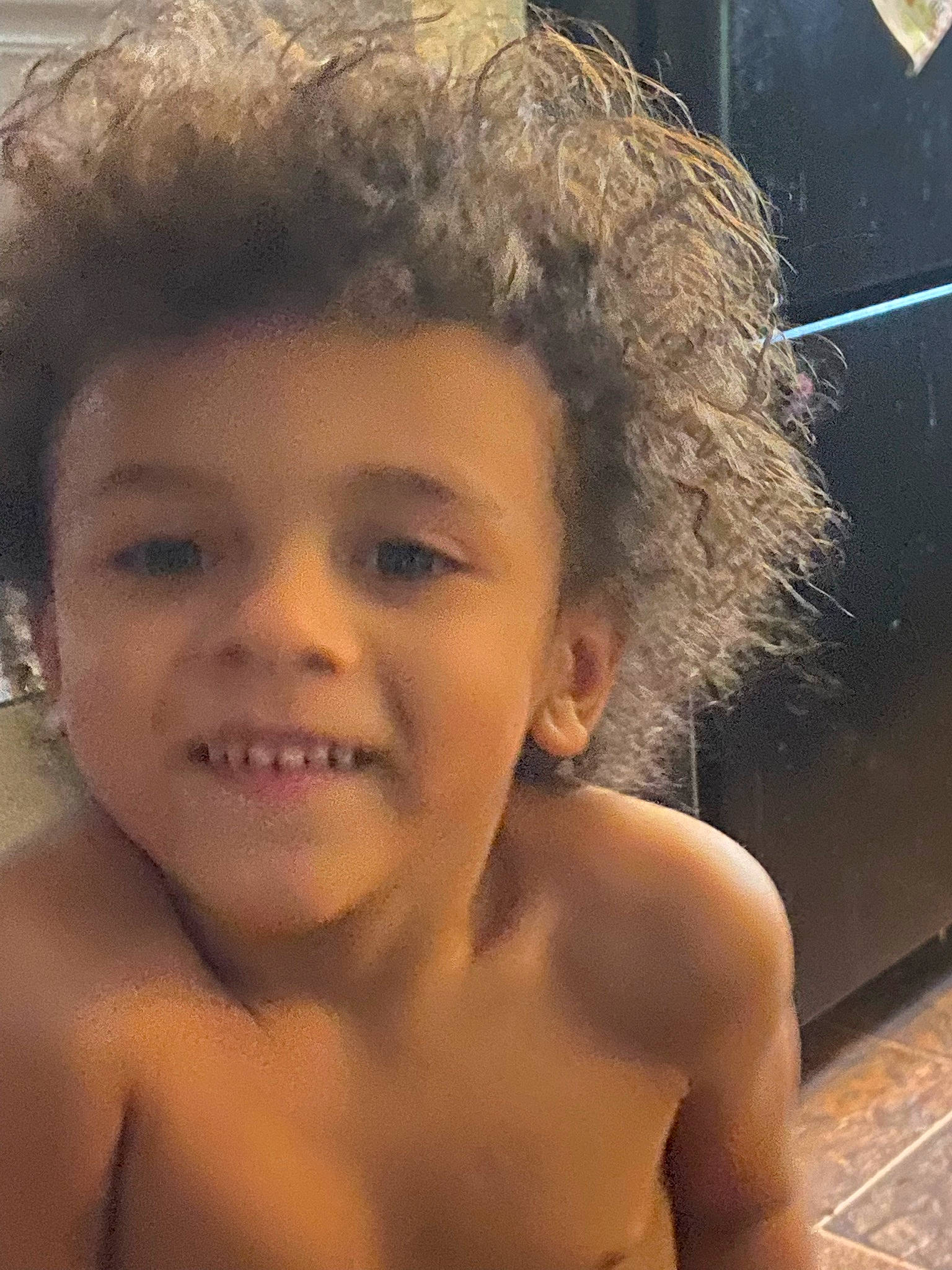 Enoch is registered to the contest to win money with this photo: arm, cheek, ear, eye, eyebrow, eyelash, face, flash_photography, forehead, head, human_body, jaw, joy, lip, mouth, muscle, neck, nose, person, shoulder