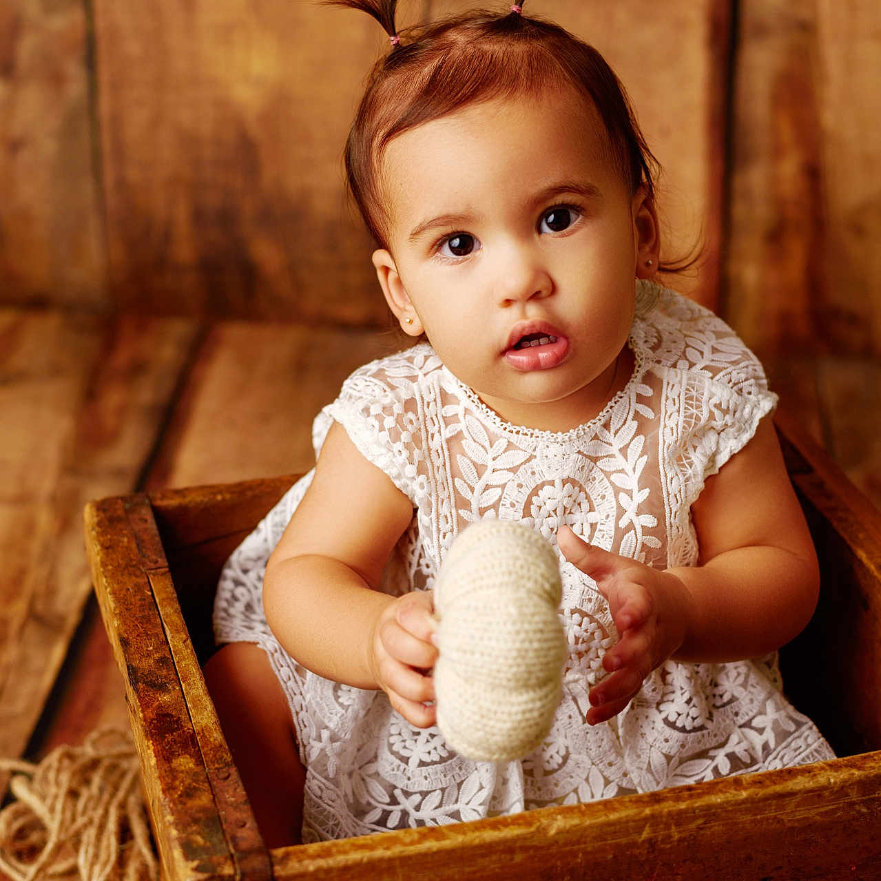 Aynah participe au concours pour gagner de l'argent avec cette photo : baby, basket, bed, bodypart, box, clothing, crate, drawer, dress, face, finger, furniture, hand, hardwood, head, person, photography, portrait, toy, wood