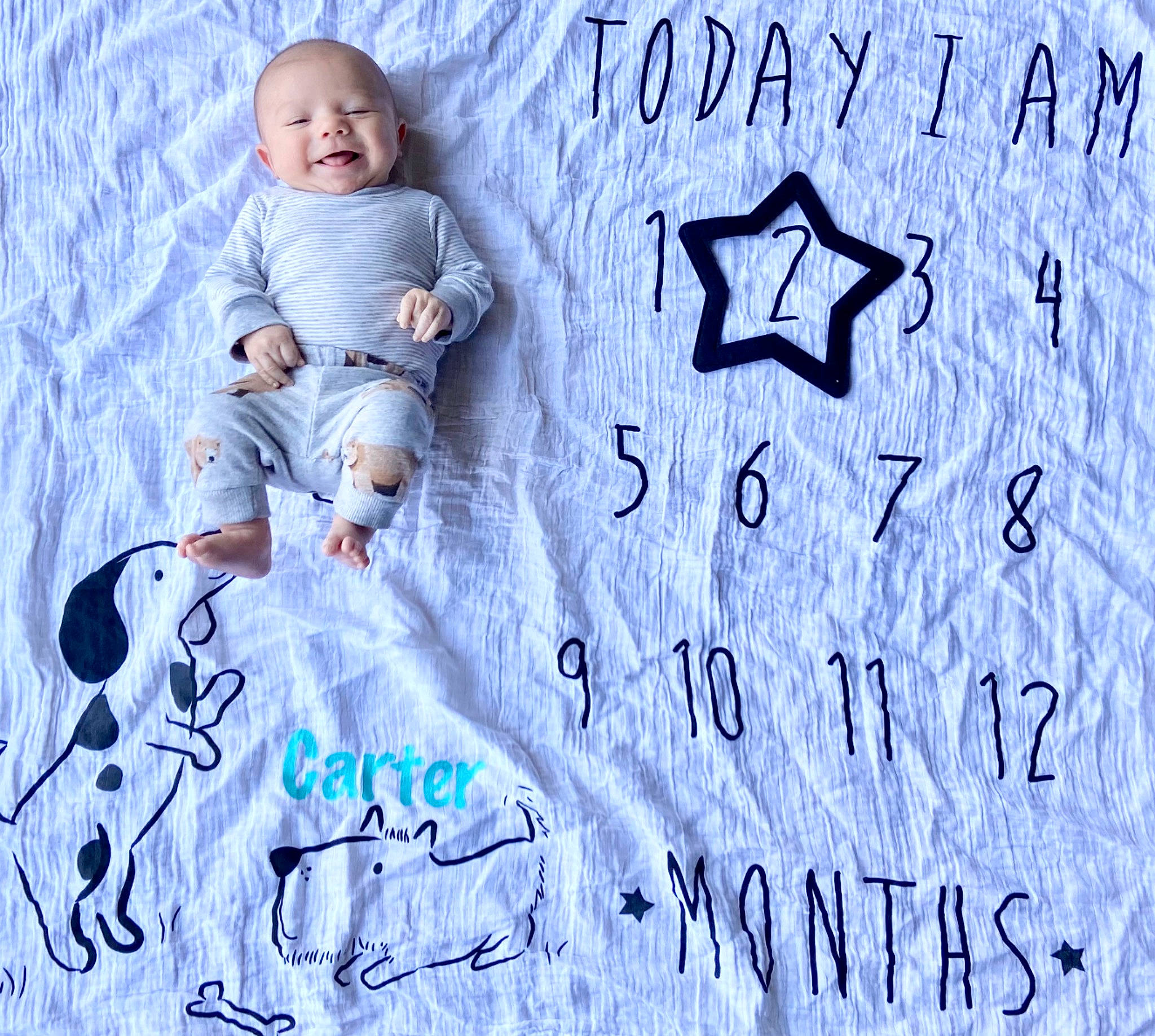 Carter joined the competition — help win amazing prizes! azure, baby, baby_toddler_clothing, design, electric_blue, facial_expression, font, gesture, graphics, handwriting, happy, illustration, organism, pattern, people, people_in_nature, person, sleeve, smile, t_shirt