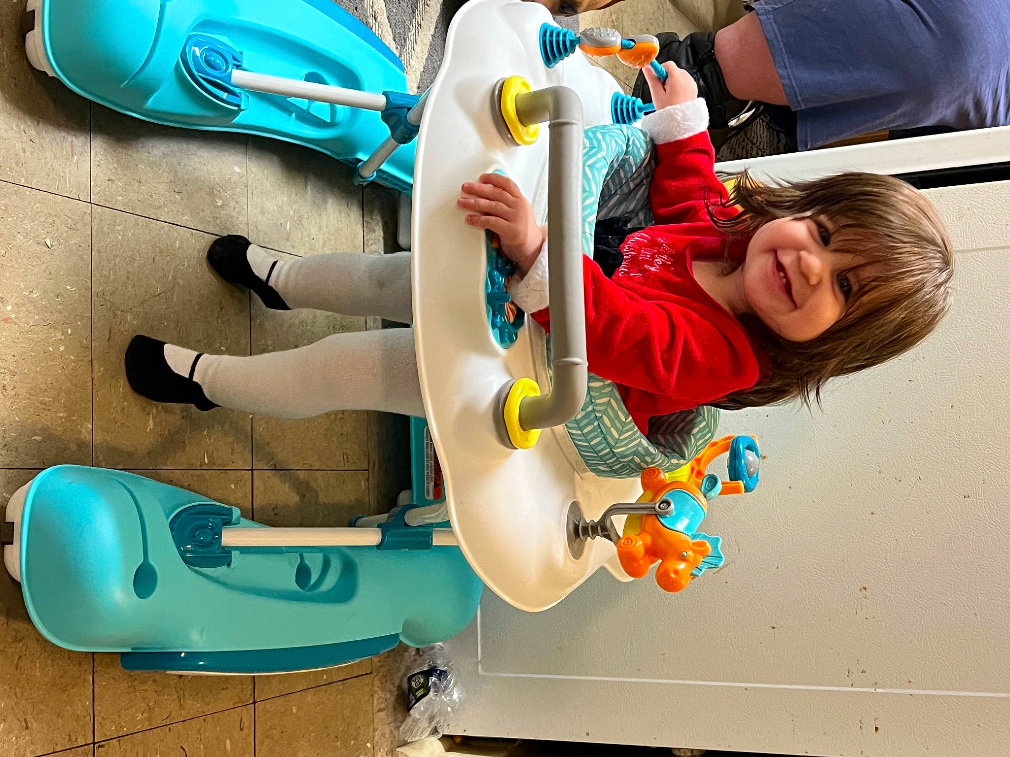Blakelynn is registered to the contest to win money with this photo: animation, baby_products, blue, child, electric_blue, fun, happy, joy, leisure, machine, person, play, recreation, sandal, shoe, smile, sneakers, t_shirt, toddler, toy