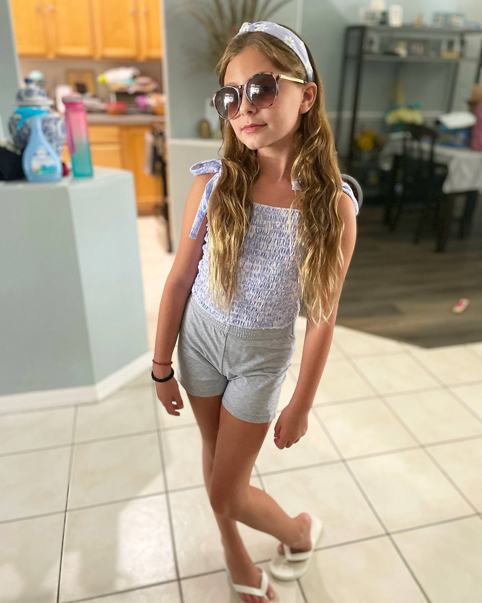 Aviann is registered to the contest to win money with this photo: black_hair, cool, eyewear, fashion_design, floor, flooring, goggles, hair, joint, knee, neck, person, skin, sleeve, sleeveless_shirt, sunglasses, thigh, trunk, vision_care, waist
