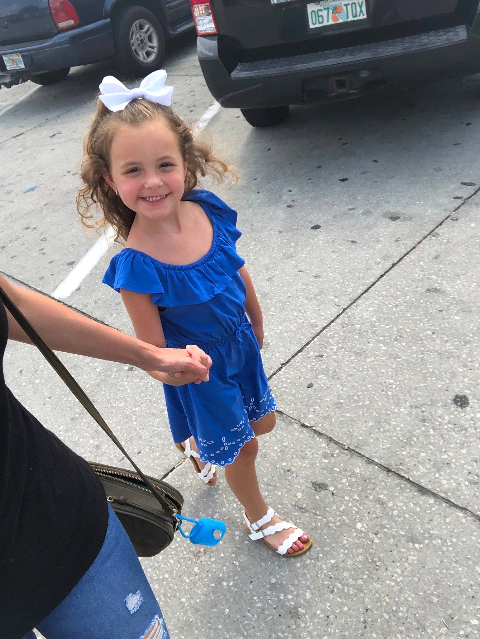 Avianna joined the competition — help win amazing prizes! auto_part, automotive_exterior, bumper, car, child, electric_blue, family_car, joy, parking, person, recreation, sidewalk, smile, toddler, vacation, vehicle, vehicle_door, wheel