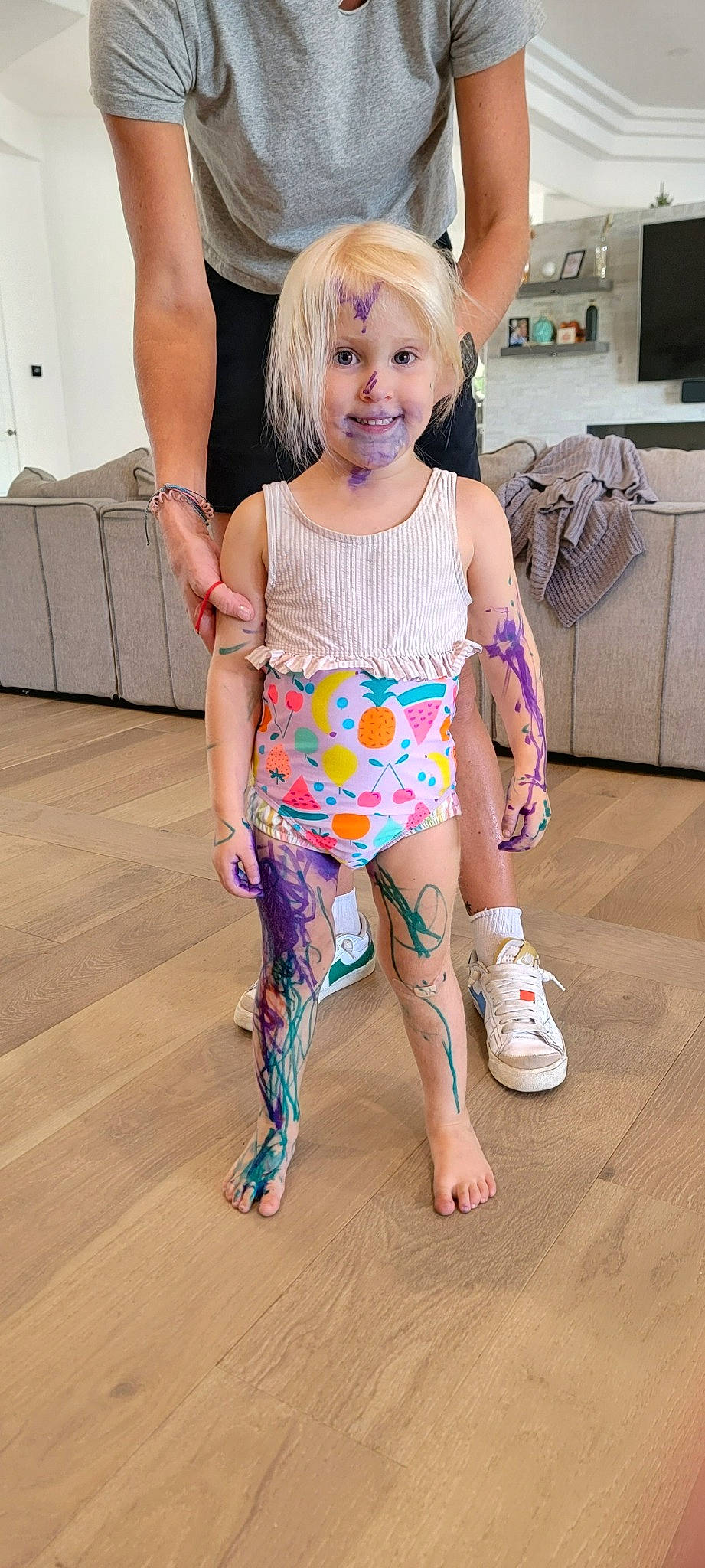 Harlow is registered to the contest to win money with this photo: abdomen, active_pants, chair, eye, face, floor, flooring, happy, human_leg, joint, joy, knee, leg, person, pink, shoulder, sleeve, sportswear, t_shirt, thigh