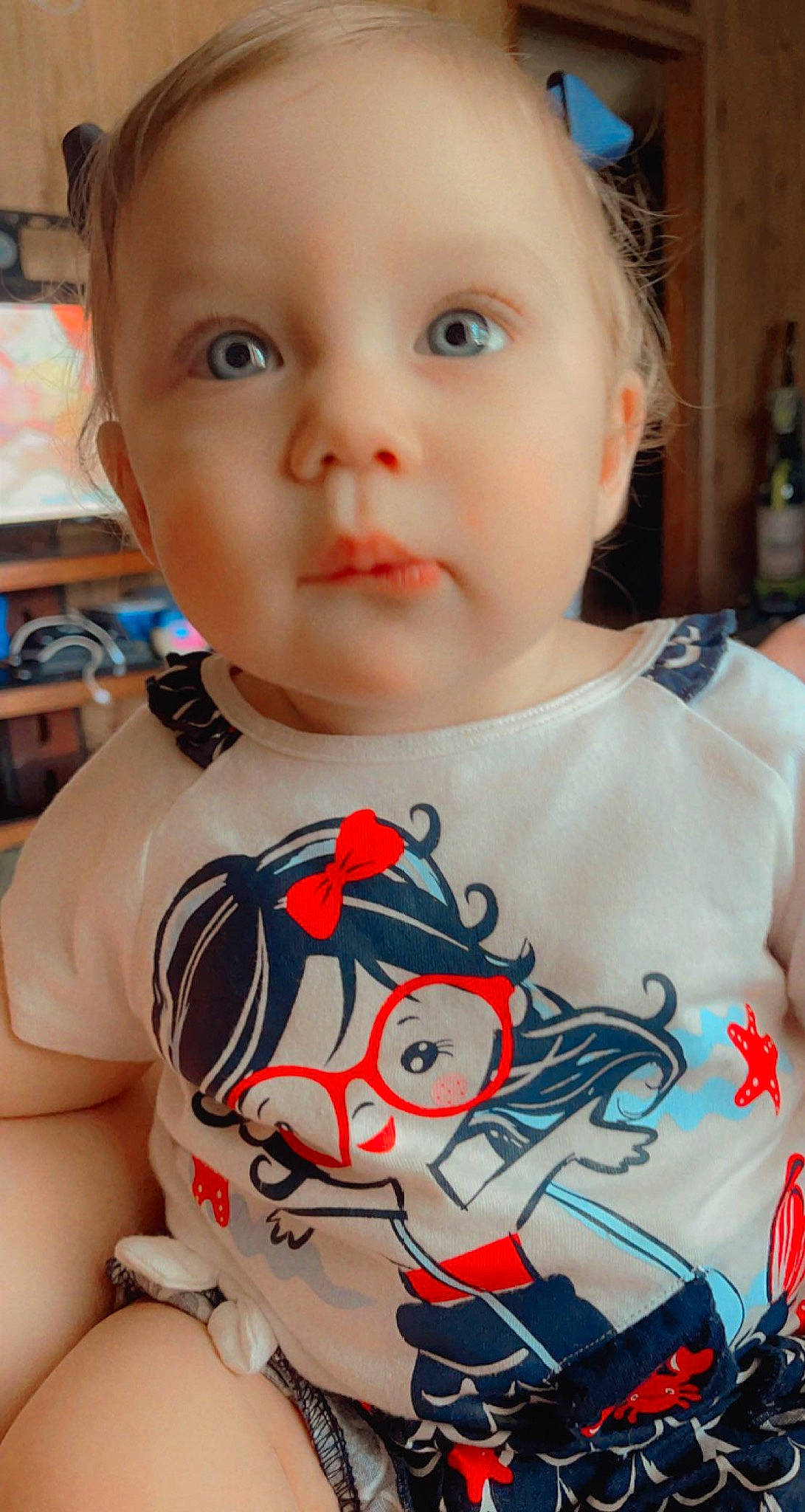 Haizlynn is registered to the contest to win money with this photo: baby_toddler_clothing, blue, cheek, chin, eyelash, face, facial_expression, forehead, hairstyle, head, joint, lip, mouth, neck, nose, organ, person, product, skin, sleeve