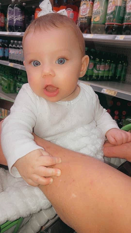 Haizlynn joined the competition — help win amazing prizes! arm, baby, baby_toddler_clothing, cheek, child, chin, eye, eyelash, finger, gesture, hand, human_body, iris, mouth, nose, organ, person, shelf, skin, sleeve