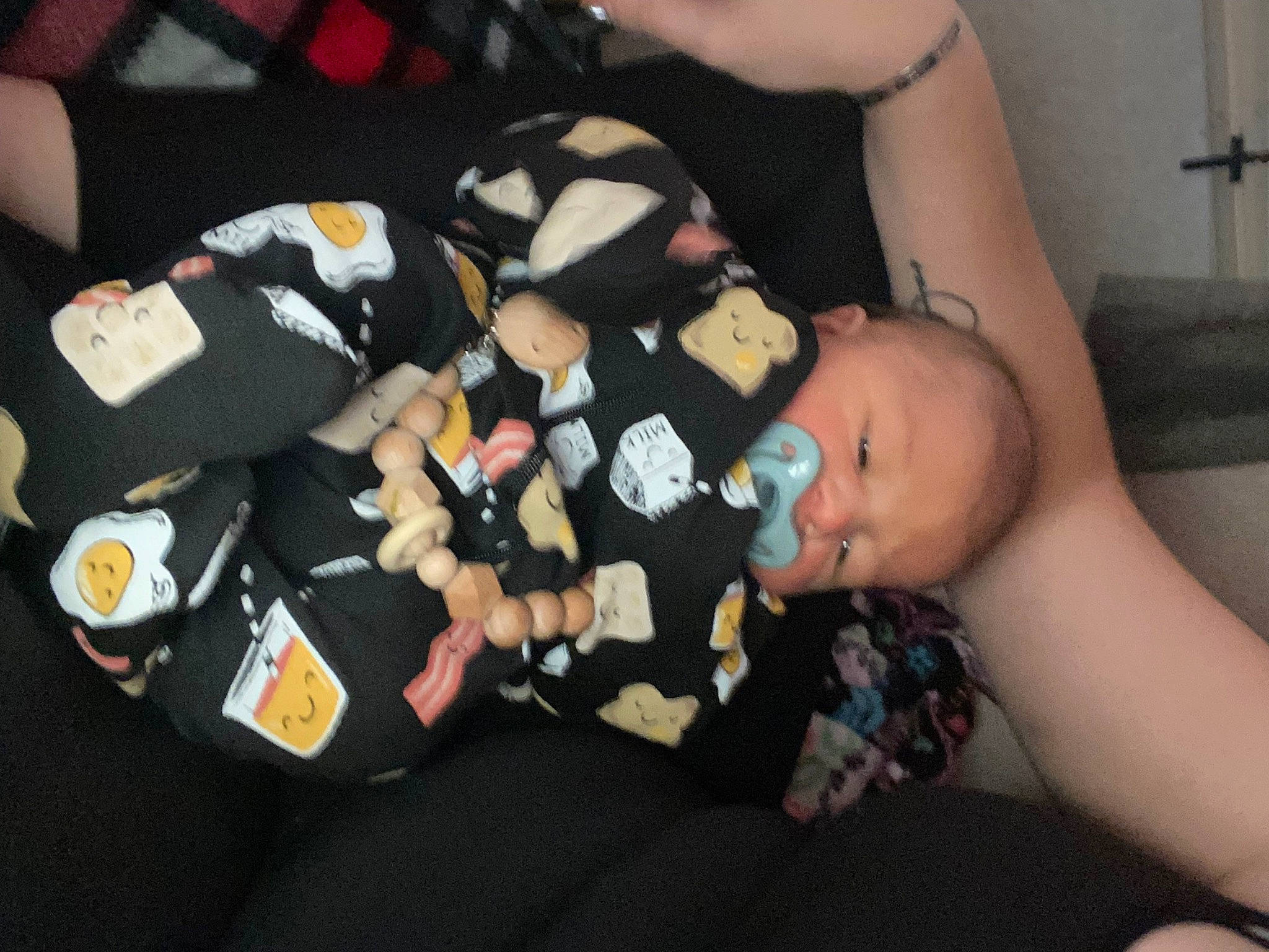 Shawn is registered to the contest to win money with this photo: abdomen, baby, baby_products, child, comfort, elbow, fun, human_leg, knee, lap, nail, person, room, sitting, thigh, toddler, wrist