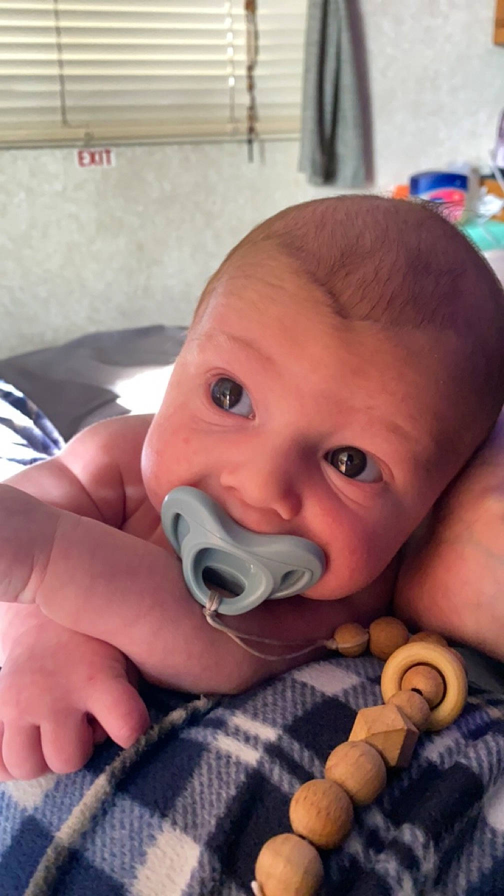 Shawn is registered to the contest to win money with this photo: baby, baby_toddler_clothing, cheek, comfort, ear, eye, eyelash, finger, gesture, hand, happy, head, iris, lip, mouth, nail, nose, person, skin, thumb