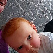 Scott joined the competition — help win amazing prizes! adult, cheeks, child, closeup, couch, cozy, curious, expression, eyes, face, home, indoor, pattern, person, portrait, red_hair, skin, toddler, wallpaper, white_shirt