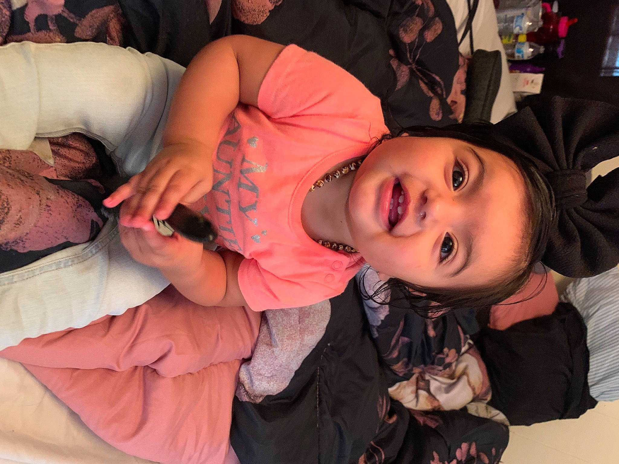 Sienna joined the competition — help win amazing prizes! child, comfort, event, facial_expression, flash_photography, fun, hairstyle, happy, head, human_body, mammal, mouth, person, pink, skin, smile, social_group, textile, toddler, trunk