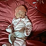 Emi participe au concours pour gagner de l'argent avec cette photo : baby, sleeping, blanket, mittens, socks, hat, infant, cozy, soft, bed, resting, cute, person, child, warm, pink, clothing, comfort, portrait, indoors