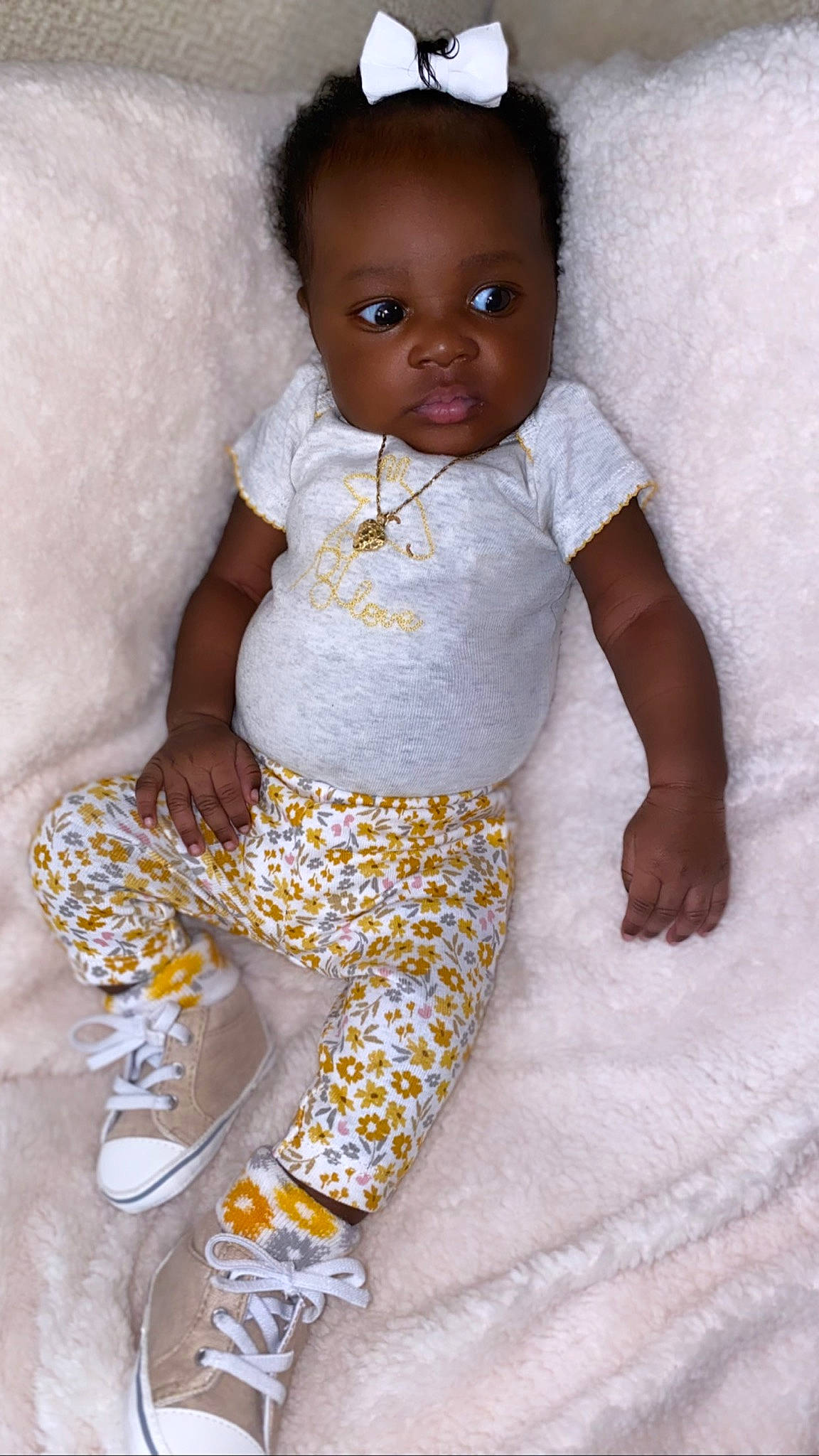Tiahna Elisè joined the competition — help win amazing prizes! arm, art, baby, baby_products, baby_toddler_clothing, baby_toys, child, doll, foot, happy, human_leg, pattern, person, sitting, sleeve, sportswear, textile, thigh, toddler, waist