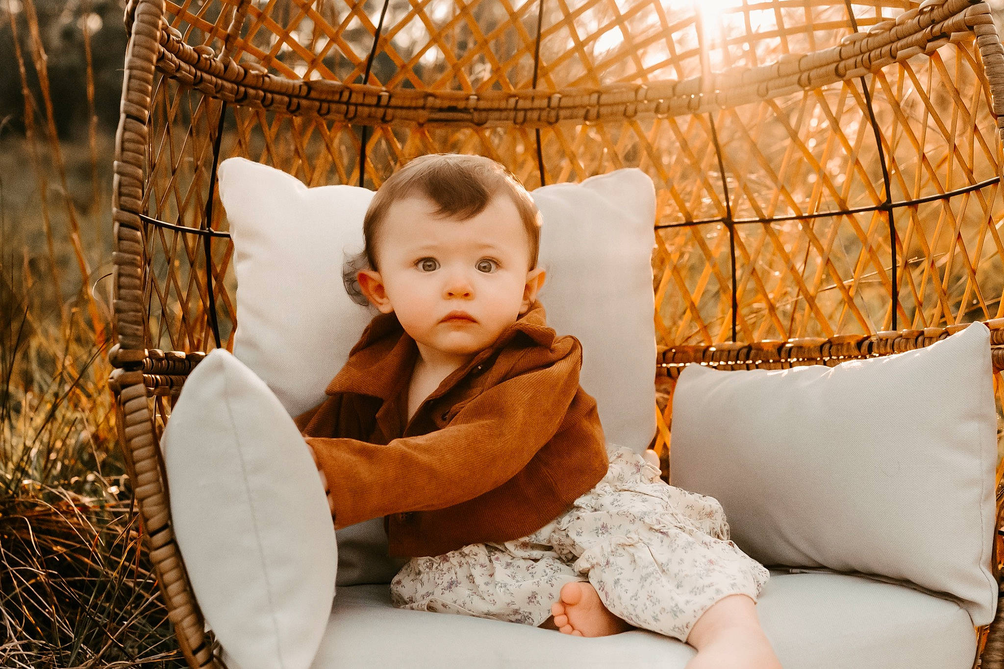 Luna is registered to the contest to win money with this photo: baby, basket, chair, child, comfort, couch, flash_photography, flooring, fun, fur, grass, happy, leisure, people_in_nature, person, sitting, sunlight, toddler, wicker, winter