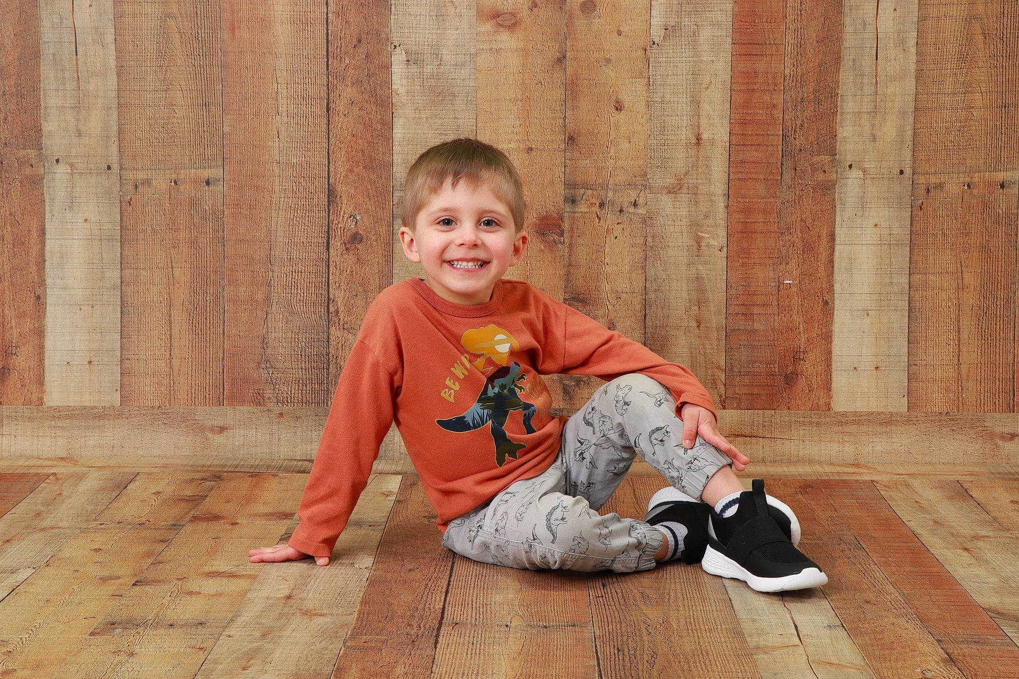 James joined the competition — help win amazing prizes! baby_toddler_clothing, child, eye, face, floor, flooring, foot, fun, grass, happy, hardwood, head, joy, leisure, person, sitting, smile, t_shirt, toddler, wood