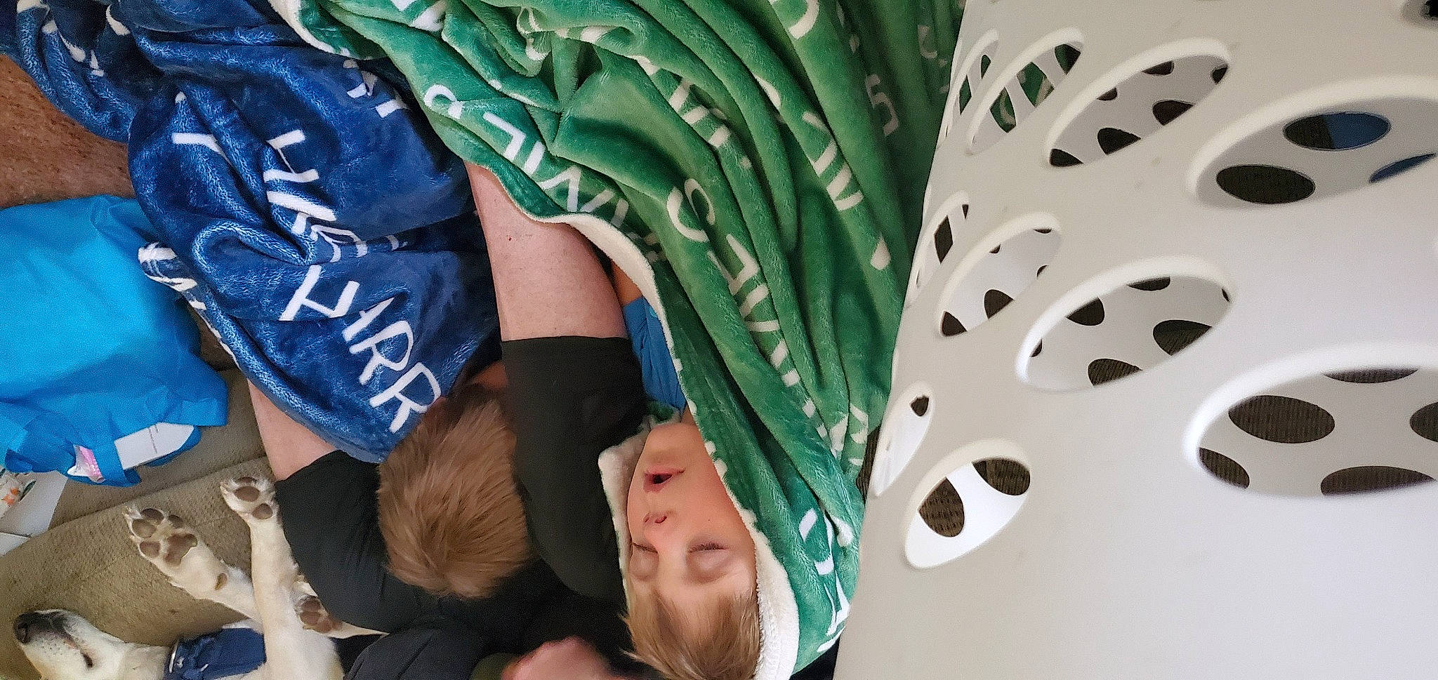 James is registered to the contest to win money with this photo: auto_part, automotive_tire, automotive_wheel_system, child, competition_event, event, fun, hat, human_leg, leisure, metal, pattern, person, personal_protective_equipment, public_event, recreation, rim, sportswear, t_shirt, thigh