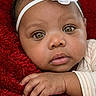 Sahara Jean is registered to the contest to win money with this photo: baby, child, closeup, clothing, cute, expression, eyes, face, flower, hand, headband, infant, newborn, portrait, red_blanket, resting, skin, soft, toddler, warm