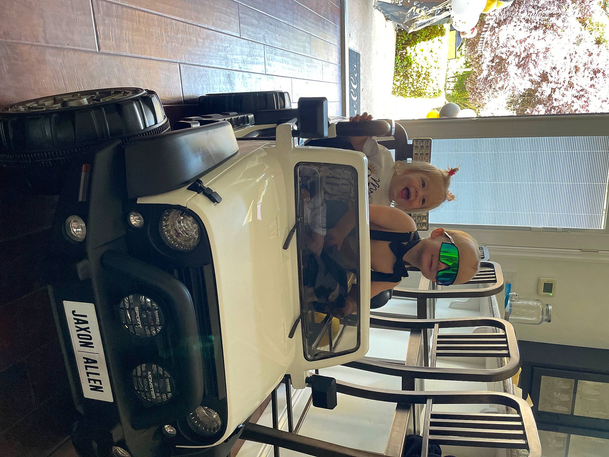 Jaxon joined the competition — help win amazing prizes! automotive_design, automotive_exterior, automotive_lighting, automotive_tire, automotive_wheel_system, building, bumper, car, computer, family_car, luxury_vehicle, machine, motor_vehicle, person, plant, room, suit, tire, tree, vehicle