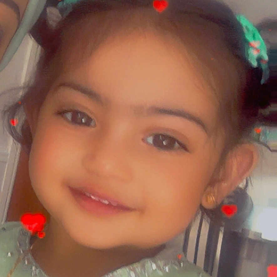 Fathima joined the competition — help win amazing prizes! child, closeup, clothing, cute, digital_effects, earrings, face, fashion, girl, green, hair, happy, heart_effects, indoors, jewelry, person, portrait, smile, traditional_clothing, young_child