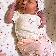 Kyla is registered to the contest to win money with this photo: adorable, baby, bear_faces, blanket, bow, child, clothing, cute, headband, hearts, infant, lying_down, newborn, patterned_pants, peaceful, pink_clothing, resting, sleeping, soft_texture, white_onesie
