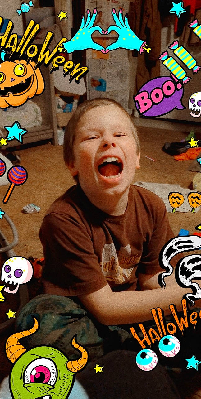 Aden is registered to the contest to win money with this photo: animation, art, child, comedy, cool, event, facial_expression, fictional_character, fun, games, happy, head, humour, mouth, person, photo_caption, play, shout, smile, t_shirt