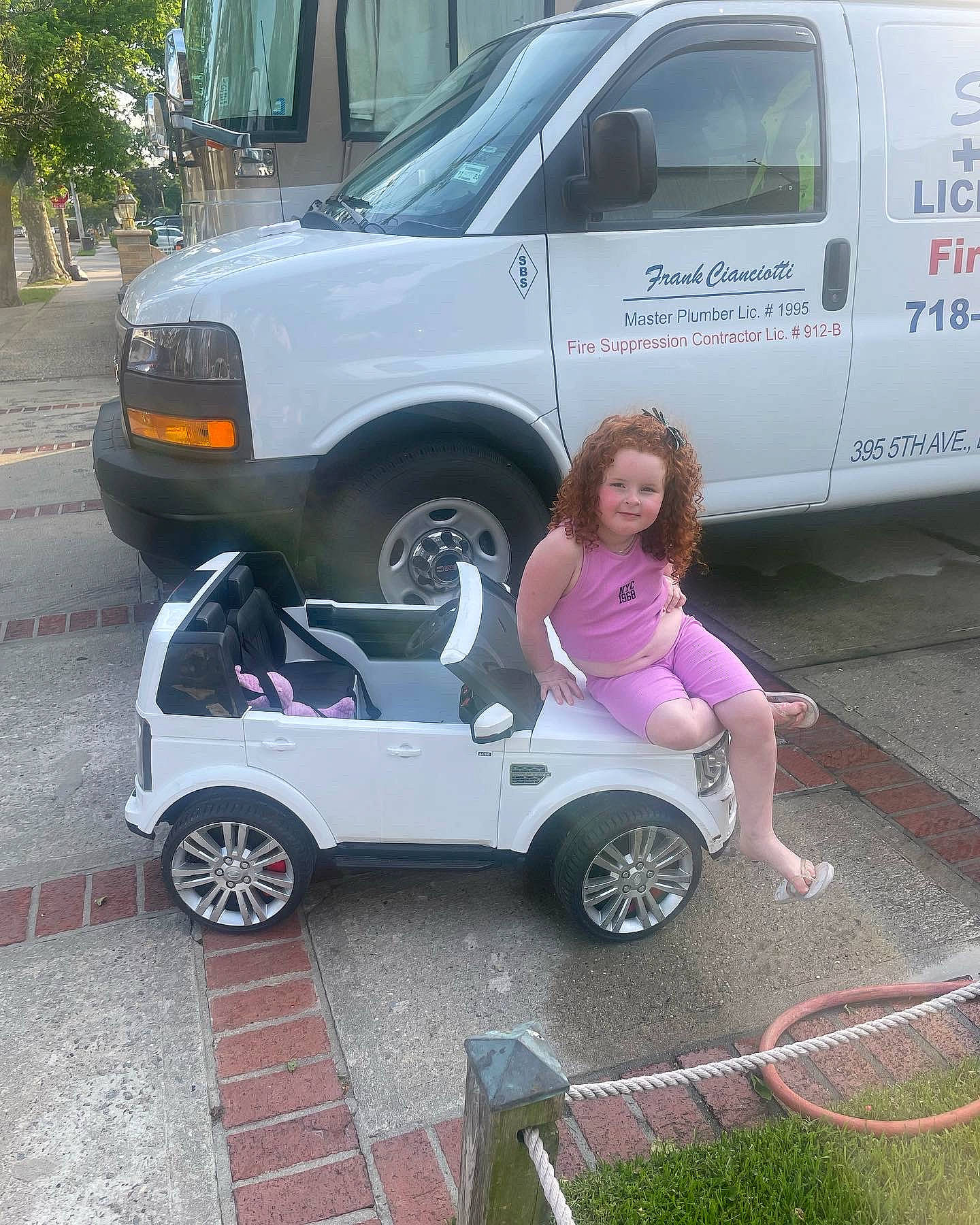 Teegan joined the competition — help win amazing prizes! automotive_design, automotive_exterior, automotive_tire, automotive_wheel_system, car, hood, joy, land_vehicle, mammal, mode_of_transport, motor_vehicle, person, photograph, pink, public_space, smile, tire, van, vehicle, vehicle_door