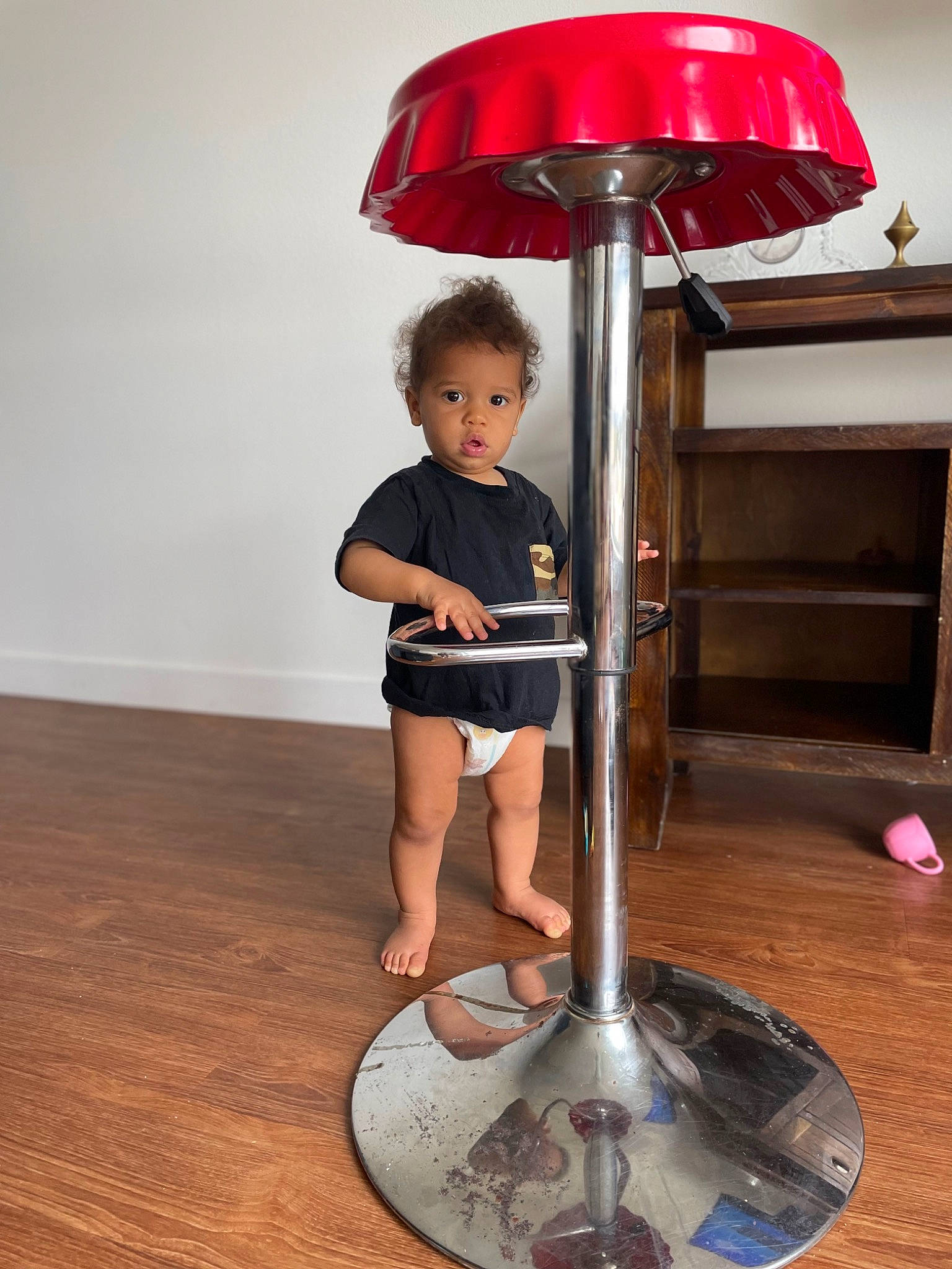 Carmelo joined the competition — help win amazing prizes! balance, child, circle, fashion_accessory, flooring, fun, hardwood, home_accessories, lamp, lampshade, light, light_fixture, lighting_accessory, person, room, shorts, t_shirt, toddler, varnish, wood
