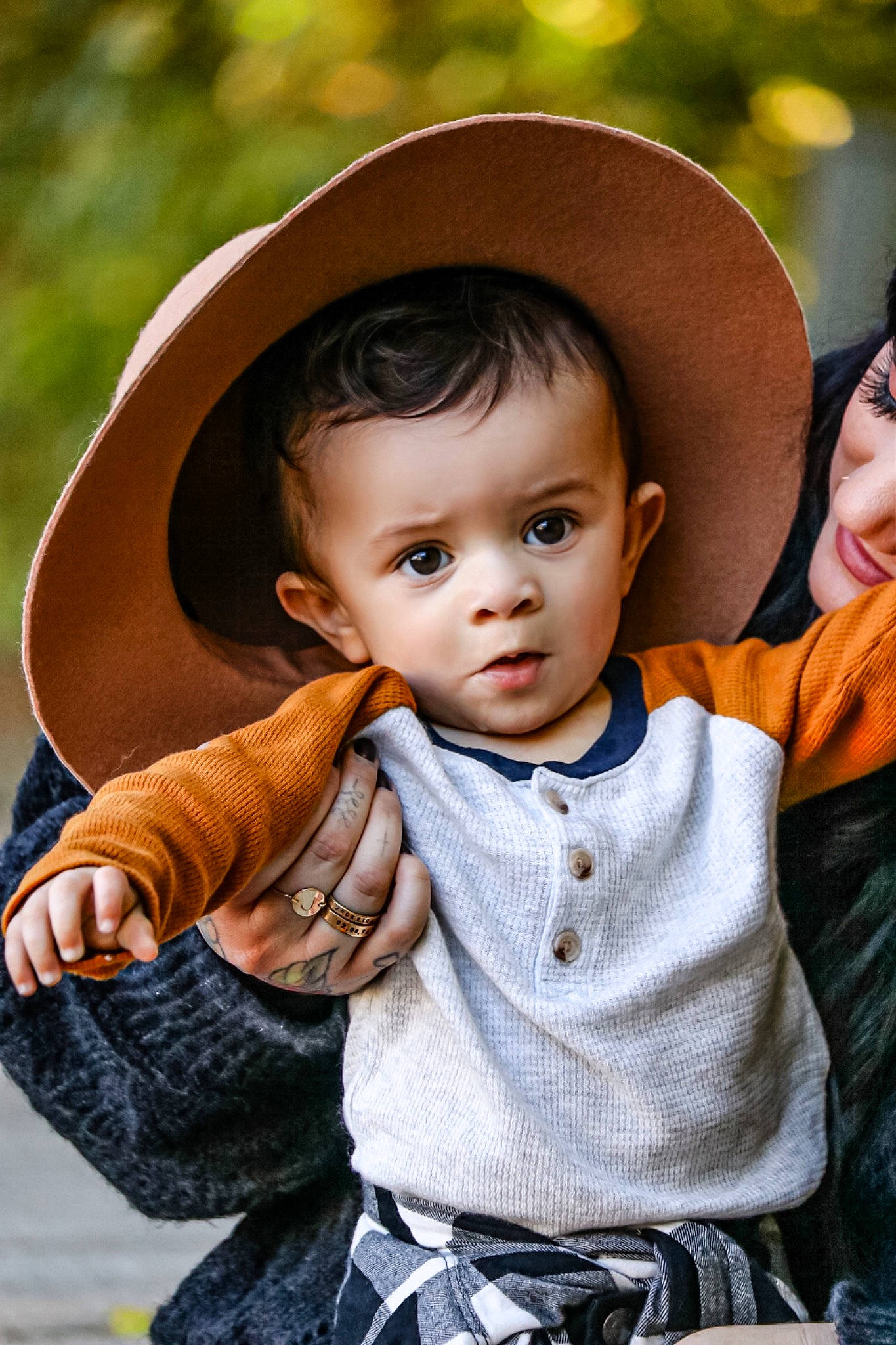 Jack is registered to the contest to win money with this photo: baby, baby_toddler_clothing, cheek, chin, eye, facial_expression, flash_photography, grass, happy, hat, head, iris, lip, nose, organ, person, photograph, skin, sleeve, sun_hat