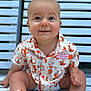 baby, child, smiling, shirt, orange, white, bench, wooden_bench, foot, hand, sitting, cute, patterned_shirt, happy, outdoor, portrait, infant, face, eyes, hair