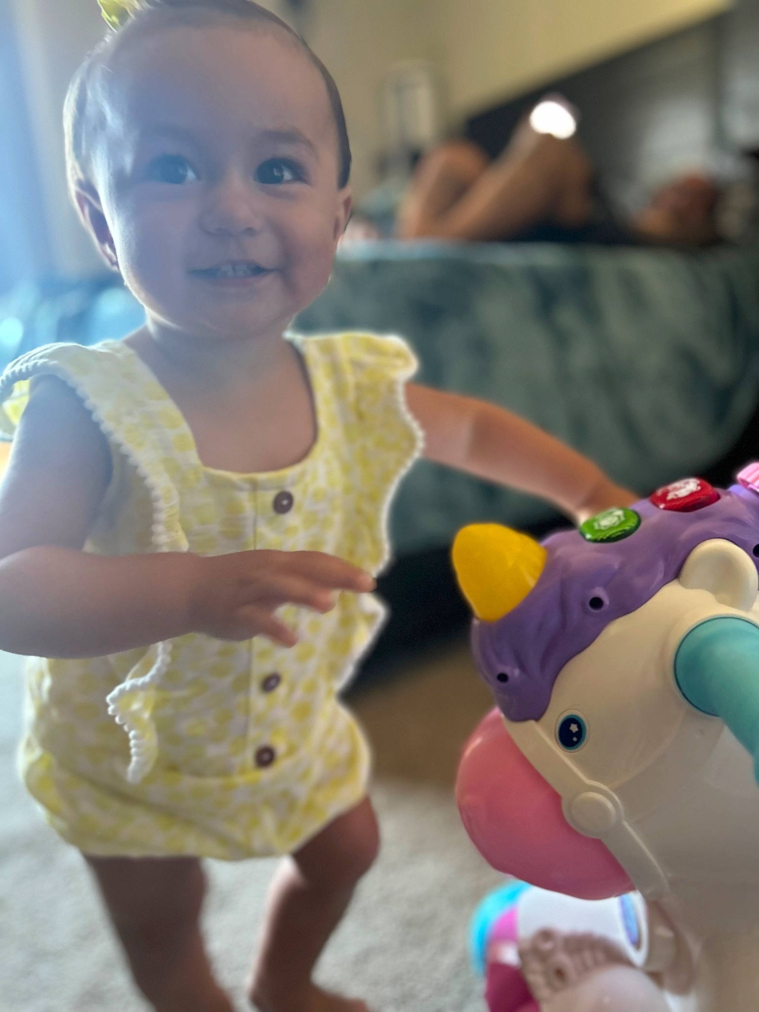 Brynn is registered to the contest to win money with this photo: baby, baby_toddler_clothing, child, event, facial_expression, finger, fun, gesture, hairstyle, happy, joy, leisure, person, recreation, shorts, skin, smile, snapshot, t_shirt, toddler