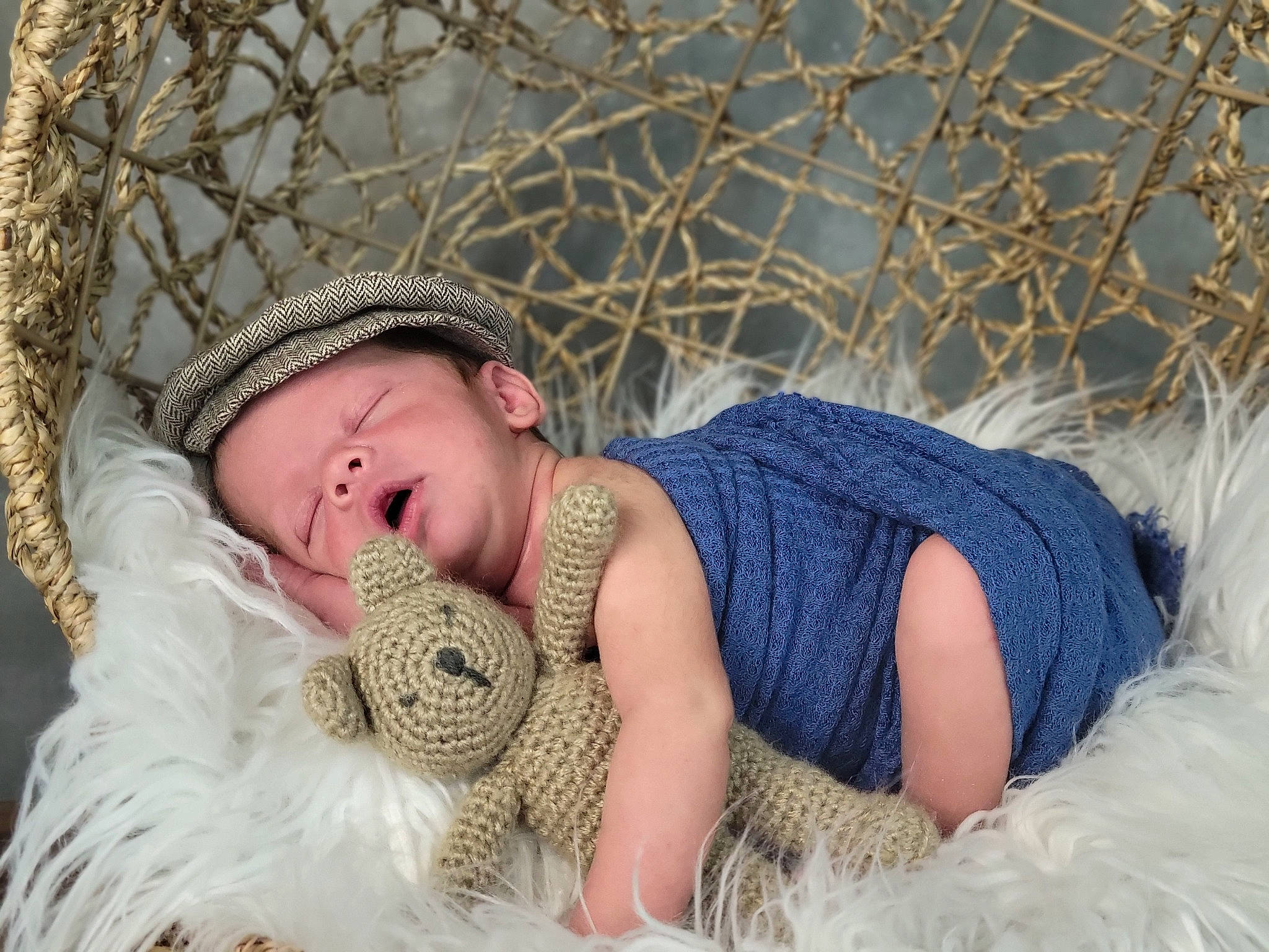 Colter is registered to the contest to win money with this photo: baby, baby_sleeping, beanie, cap, comfort, crochet, eye, fashion_accessory, fur, grass, happy, hat, knit_cap, linens, pattern, person, sitting, sun_hat, toddler, winter