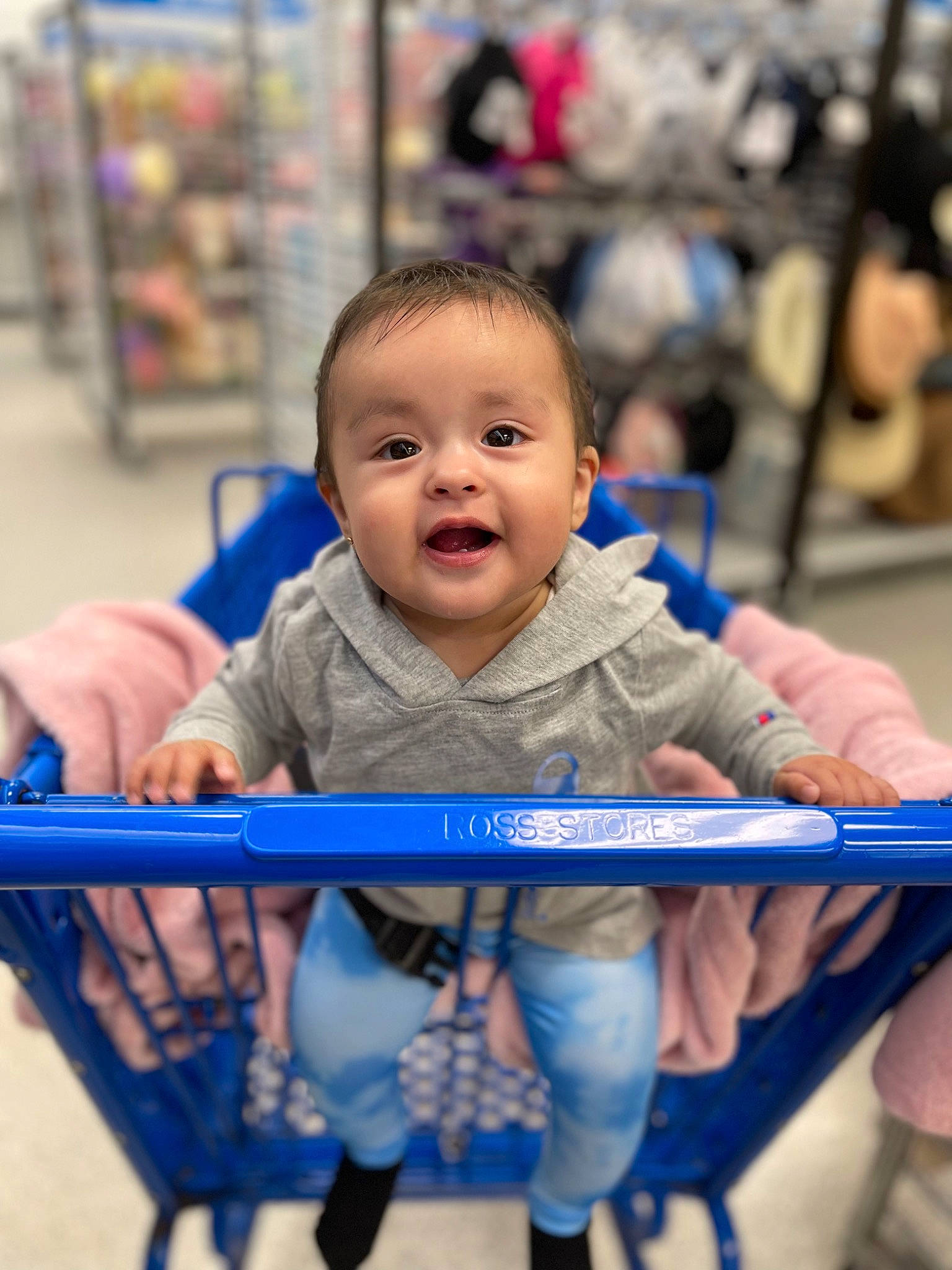 Camila joined the competition — help win amazing prizes! baby, child, customer, electric_blue, event, facial_expression, fun, happy, leisure, person, play, player, recreation, retail, sitting, smile, sports, sports_equipment, toddler, wheel