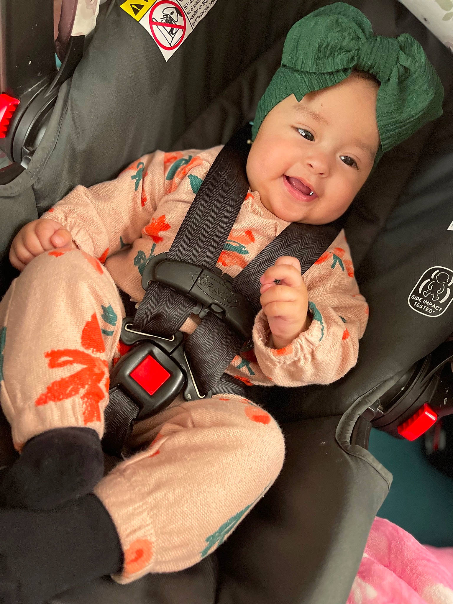 Camila joined the competition — help win amazing prizes! auto_part, baby, baby_carriage, baby_in_car_seat, baby_products, baby_safety, car_seat, car_seat_cover, carmine, child, comfort, headwear, joy, lap, mammal, motor_vehicle, person, seat_belt, sitting, smile